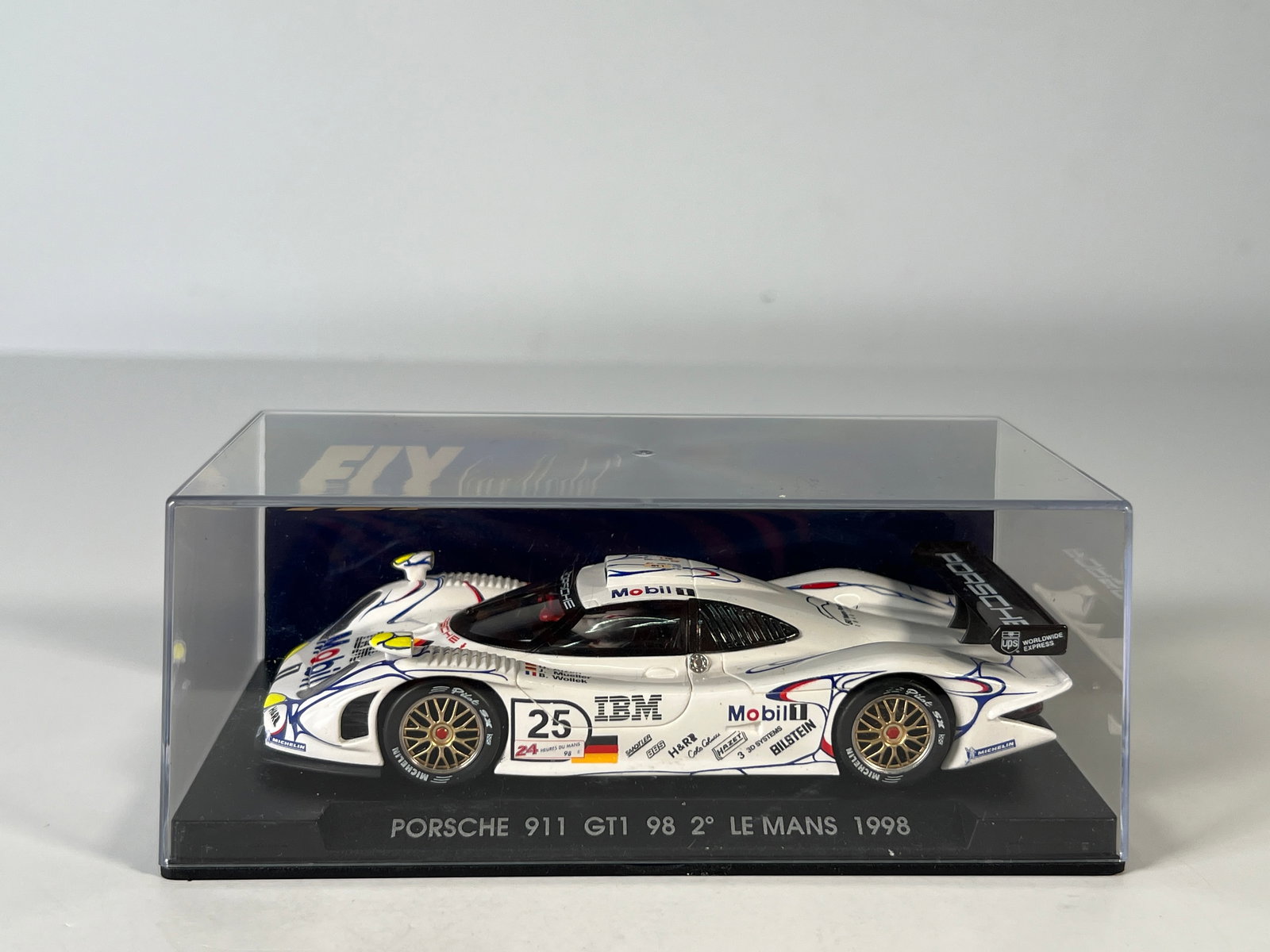 Fly Car Model Porsche 911 GT1 98 Le Mans 1998 #25: Fly Car Model Porsche 911 GT1 98 2nd Le Mans 1998 #25 Mobil1 1/32 Slot Car. Reference #A72, with original case. Weight: 6.4 oz.