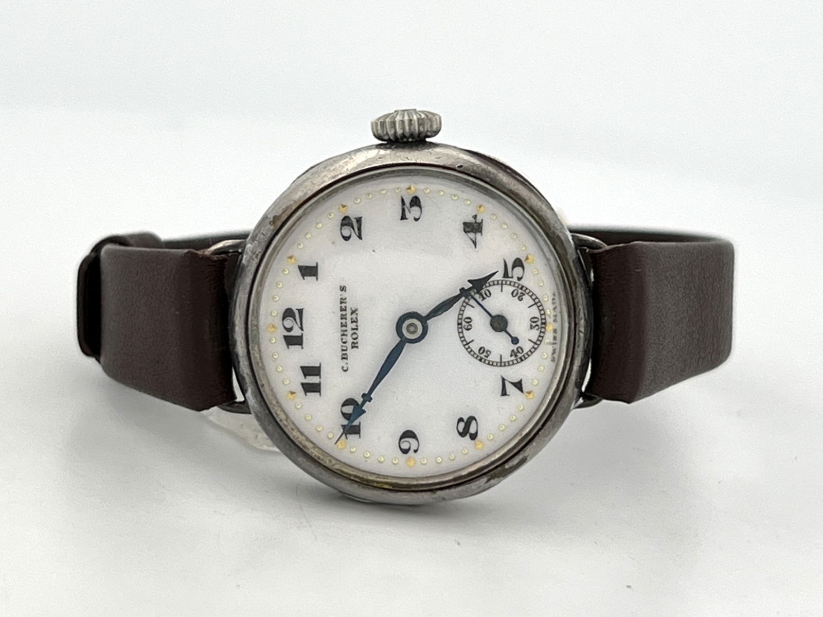 Early Vintage Rolex Retailed by C. Bucherer, circa 1920sâ€“1930s.: Early vintage Rolex wristwatch retailed by C. Bucherer, circa 1920s–1930s.Sterling silver case stamped RWC for Rolex Watch Company and 92515j movement