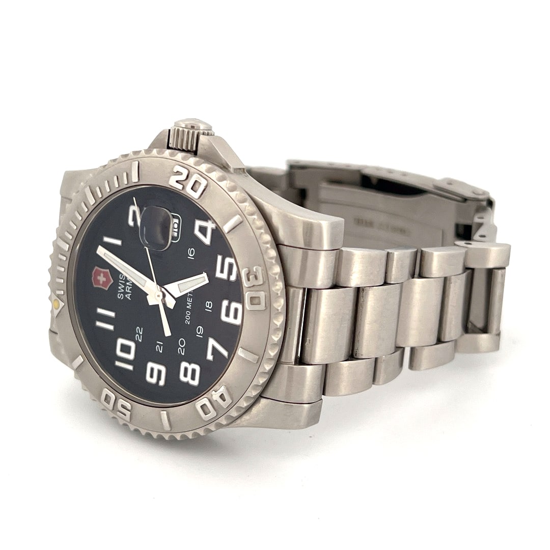 Victorinox Swiss Army Maverick II Stainless Steel Wristwatch Model 24702: Victorinox Swiss Army "Maverick II" wristwatch, model 24702 released circa 2003. Features a stainless steel case and bracelet, black dial with luminous hands and markers, and a rotating beze