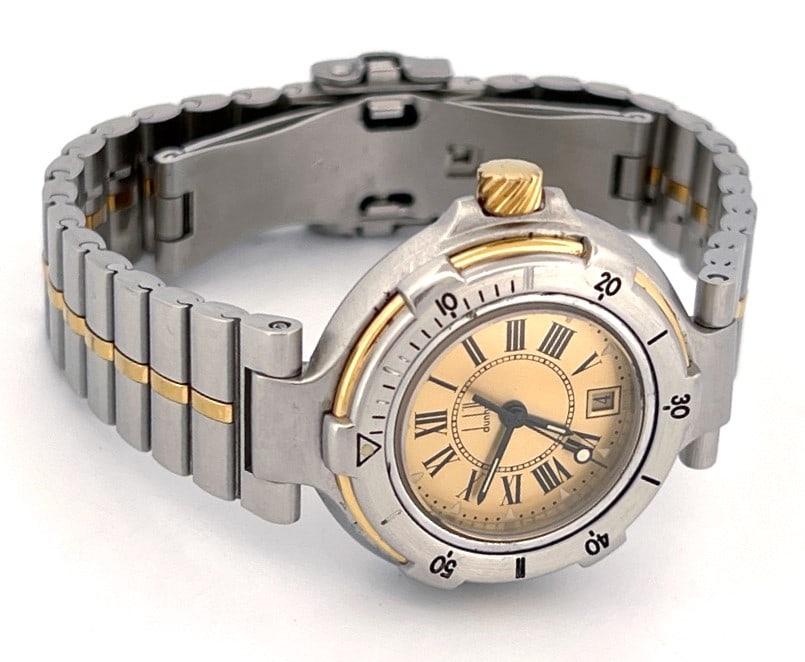 Alfred Dunhill Millennium Two-Tone Stainless Steel Wristwatch (rare gold dial): Dunhill Millenium wristwatch featuring a two-tone stainless steel case and bracelet, a rare gold-tone dial with Roman numeral markers, date window, and rotating bezel. Quartz movement. Water resistant