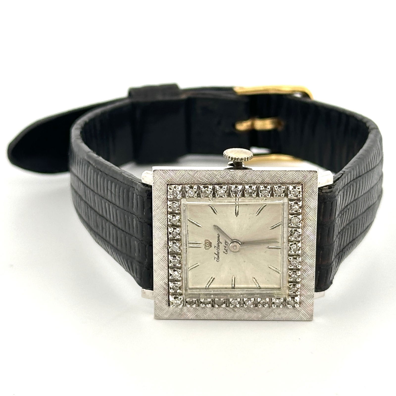 Jules Jurgensen Diamond Wristwatch: Jules Jurgensen square wristwatch. The watch features a diamond bezel and a black leather band.