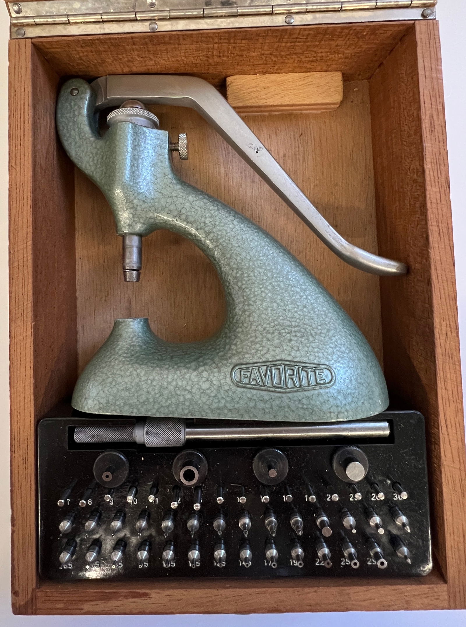 Vintage Favorite Staking Tool Set: A vintage Favorite staking set, used for for installing and adjusting friction jewels and bushings in mechanical watch movements. Comes in a wooden box.