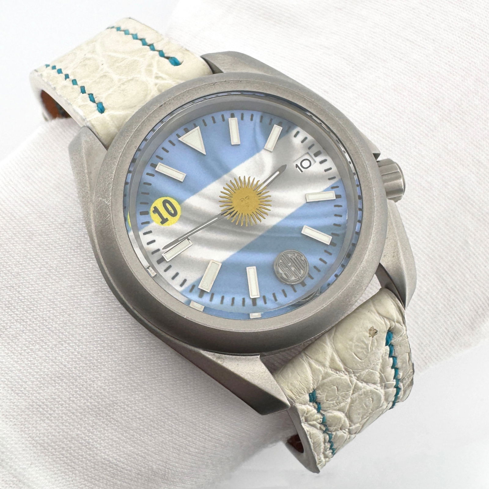 El Diez - Campeon! by SHM Creations: El Diez - Campeon is a tribute to the legacy of Argentine soccer greats Maradona and Messi. Both captained the World Cup championship teams wearing the gold armband and the number 10, which is