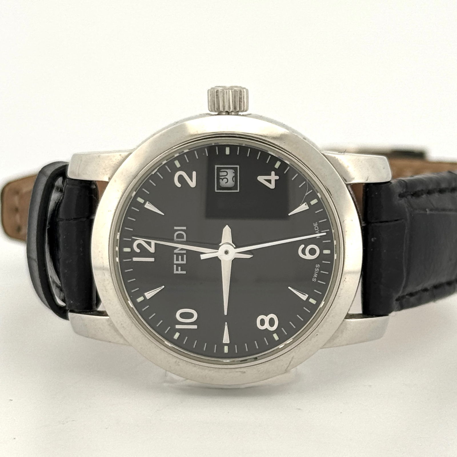 Fendi 2100L Ladies Wristwatch, Black Dial, Leather Band: Fendi ladies wristwatch, model 2100L serial 010-584. Features a black dial with date window, stainless steel case, and black leather band. Powered by a Swiss Ronda quartz movement.