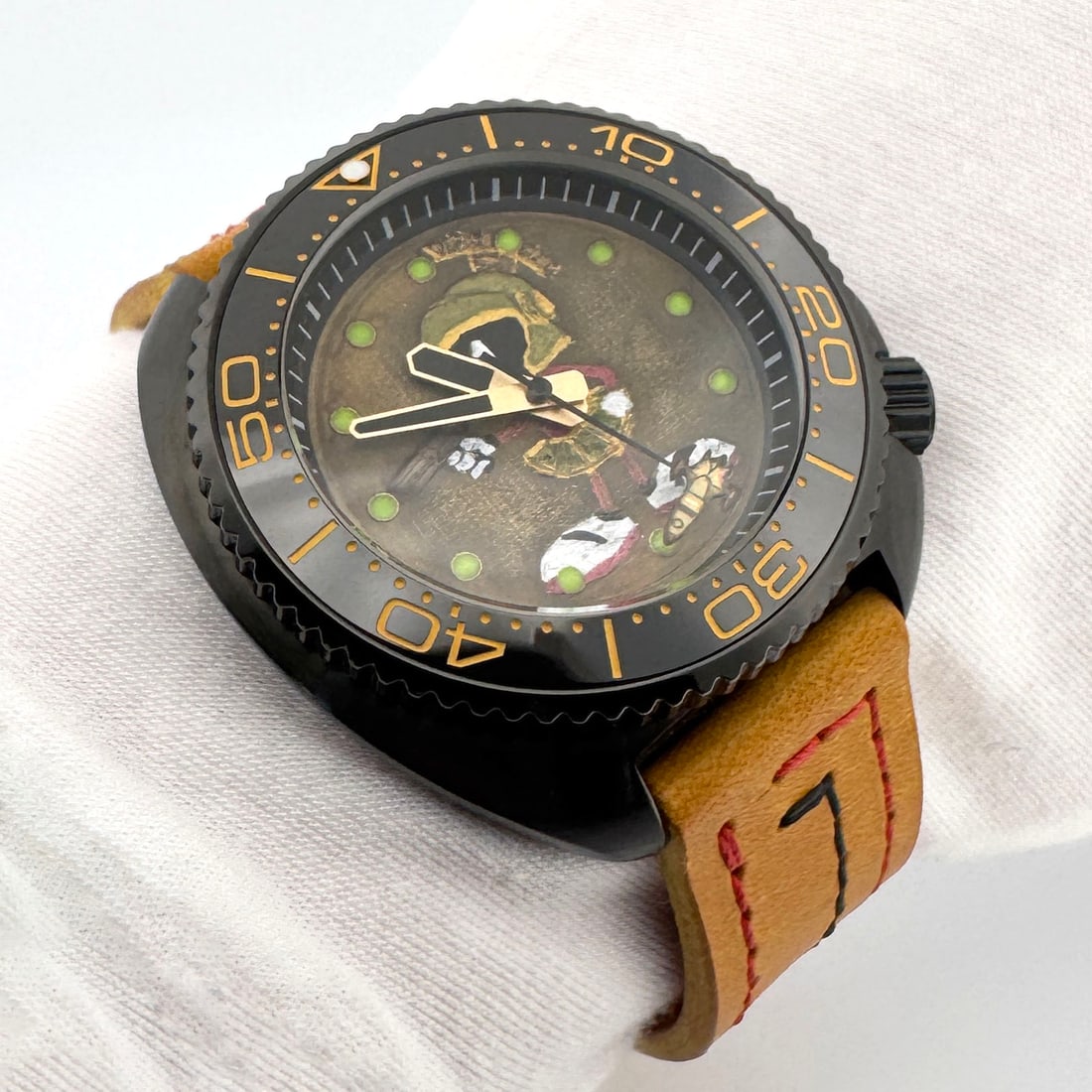 The Martian by SHM Creations: The Martian is a concept art piece featuring a hand painted 2.5D relief image cut into a brass dial with a custom rocket seconds hand. It is powered by a Seiko automatic movement and housed