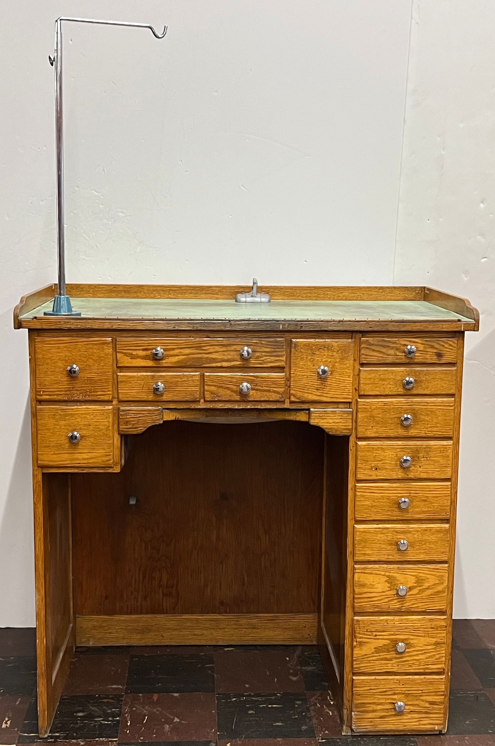 Jeweler's Desk with Metal Stand: Jeweler's desk with multiple drawers and a metal stand. Dimensions: 38.5 x 37 inches.