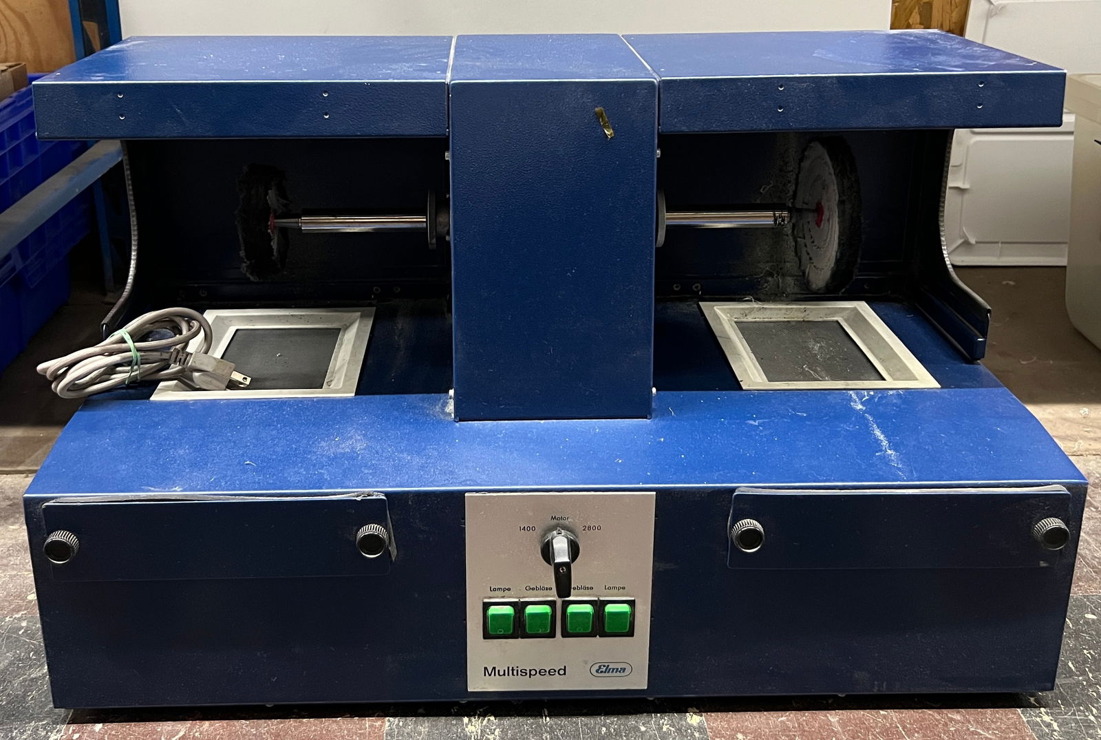 Elma Multispeed Polishing Machine: Elma Multispeed polishing machine. Features dual polishing wheels, variable speed settings, and integrated dust collection. Ideal for polishing jewelry, metal parts, and other small items. Shows