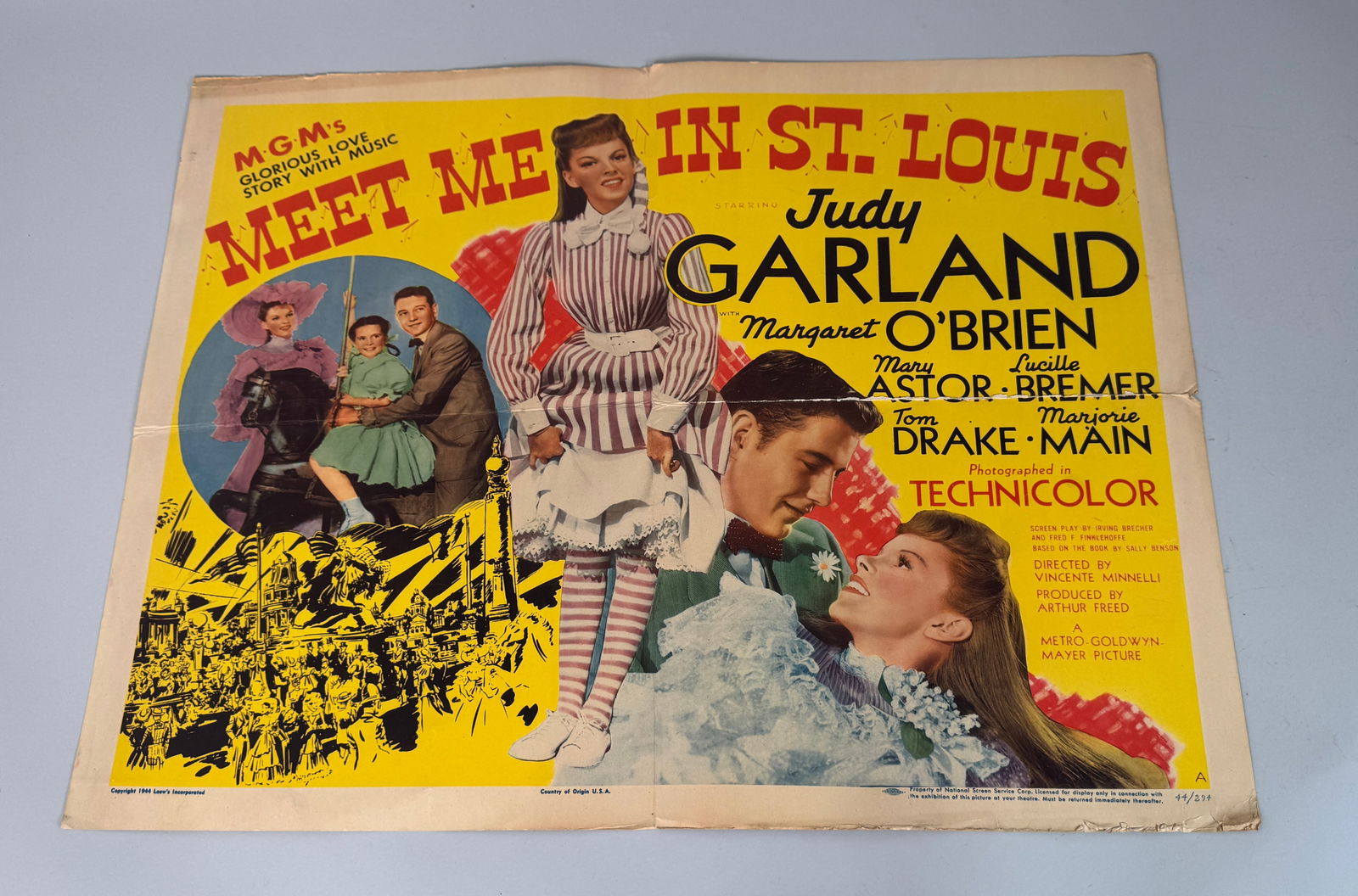 "Meet Me in St. Louis" Movie Poster, Judy Garland: "Meet Me in St. Louis" movie poster featuring Judy Garland, Margaret O'Brien, Mary Astor, Lucille Bremer, Tom Drake, and Marjorie Main. Dimensions: 22 x 28 inches.