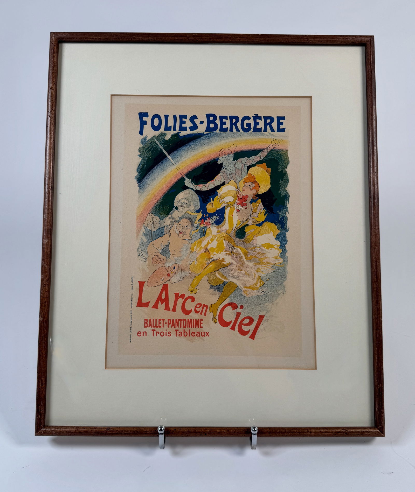 "Folies-BergÃ¨re L'Arc en Ciel" Framed Lithograph: Framed color lithograph advertising Jules Chéret's 1896 "L'Arc en Ciel" at the Folies-Bergère performing arts theater in Paris, France. The frame measures 18 x 15