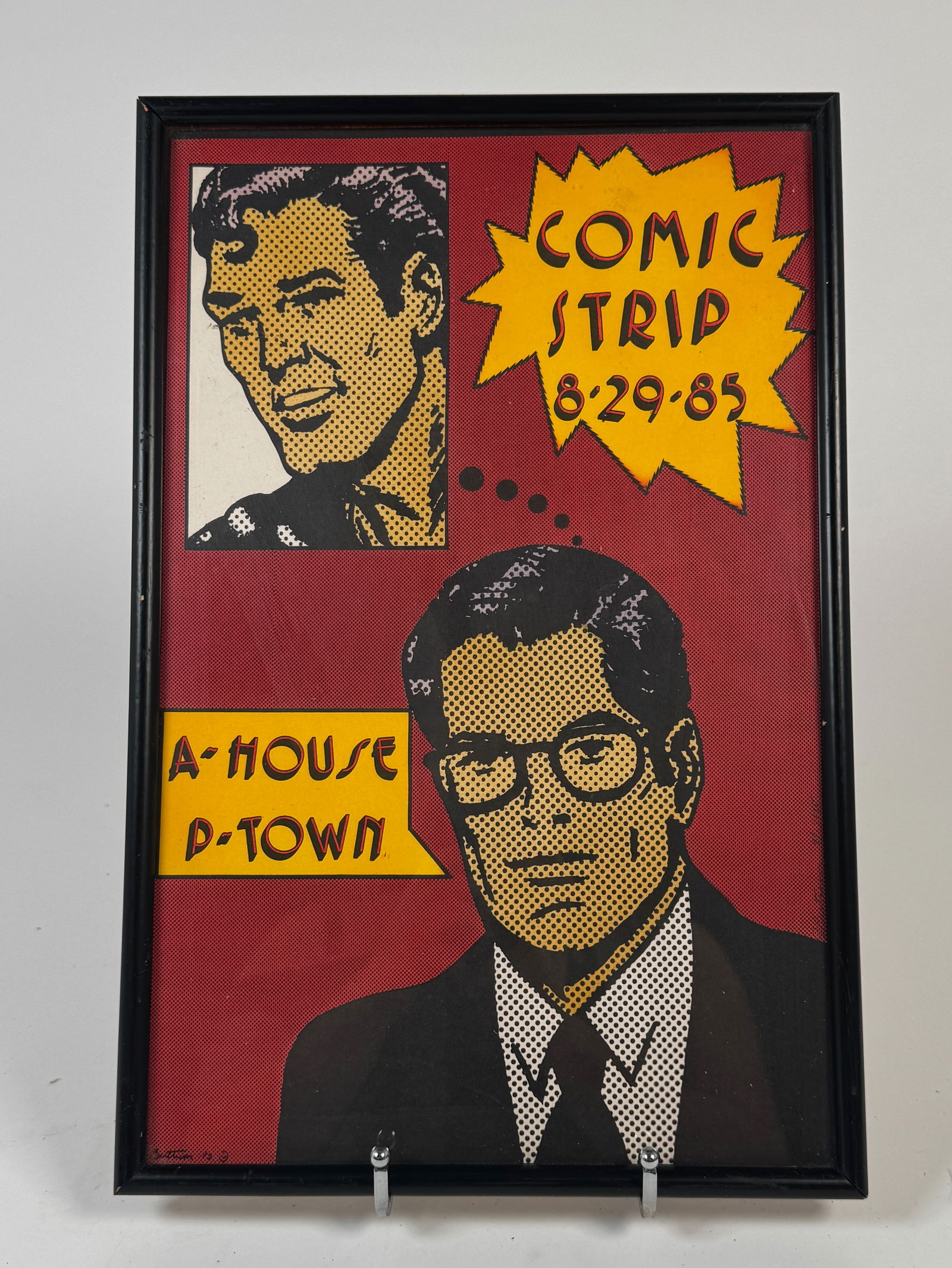 Pop Art Style Print - "Comic Strip 8-29-85, A-House P-Town": Print titled "Comic Strip 8-29-85, A-House P-Town," featuring pop art style illustrations of two figures. Framed. Dimensions: 16 5/8 x 10 7/8 inches.
