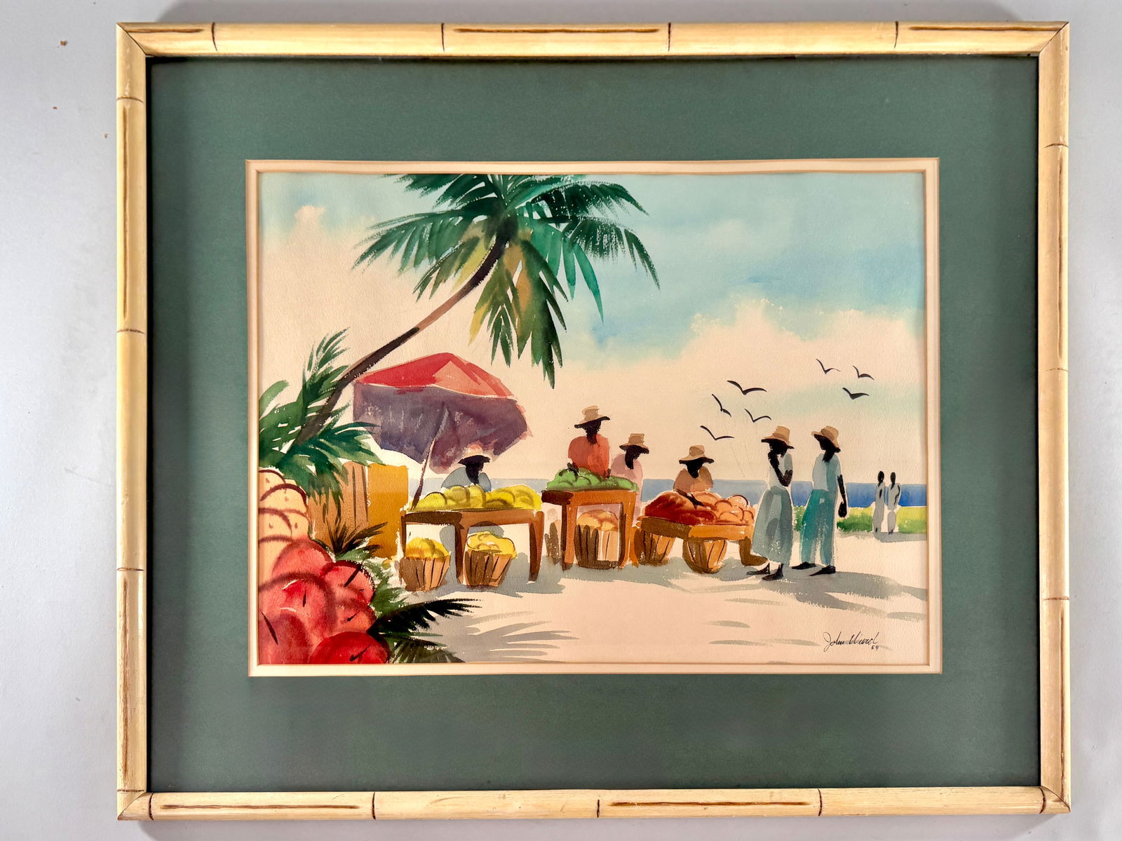 John Ward watercolor, signed and dated '54: Watercolor painting by John Ward, signed and dated '54. Depicts a tropical scene with figures. Framed. Frame: 27.75 x 33.75 inches; Print: 17.25 x 24 inches.
