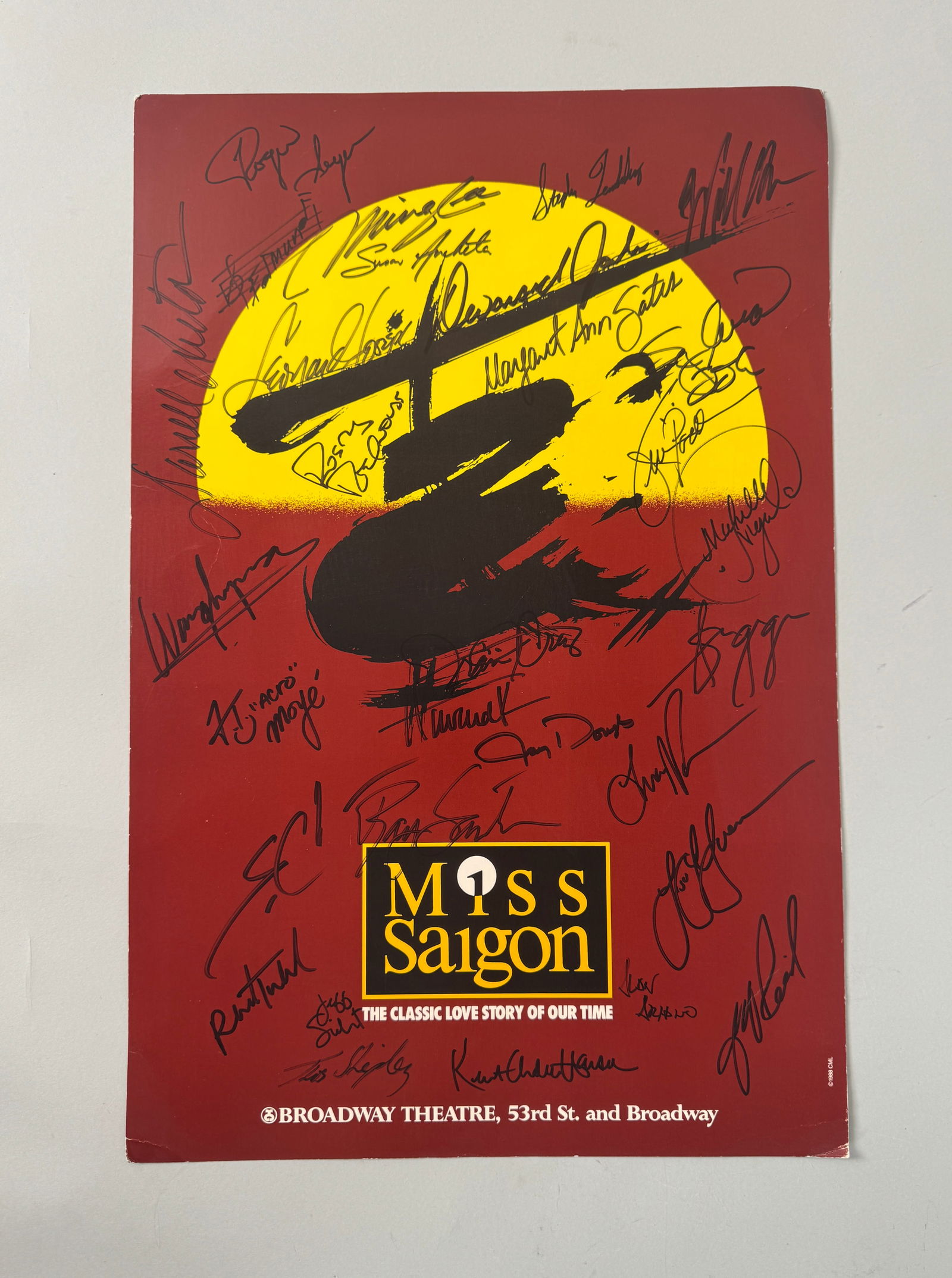 Miss Saigon Signed Broadway Poster: Miss Saigon Broadway poster, signed by cast members. Dimensions: 22 x 14.5 inches.