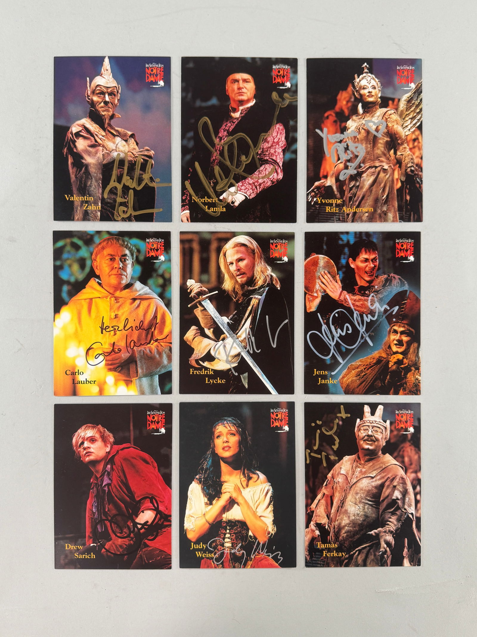 Nine Postcards from The Hunchback of Notre Dame (German Play): Nine postcards of the cast from the 1999 German theatrical adaptation of Disney's "The Hunchback of Notre Dame", each signed by the cast member pictured on the front. Includes