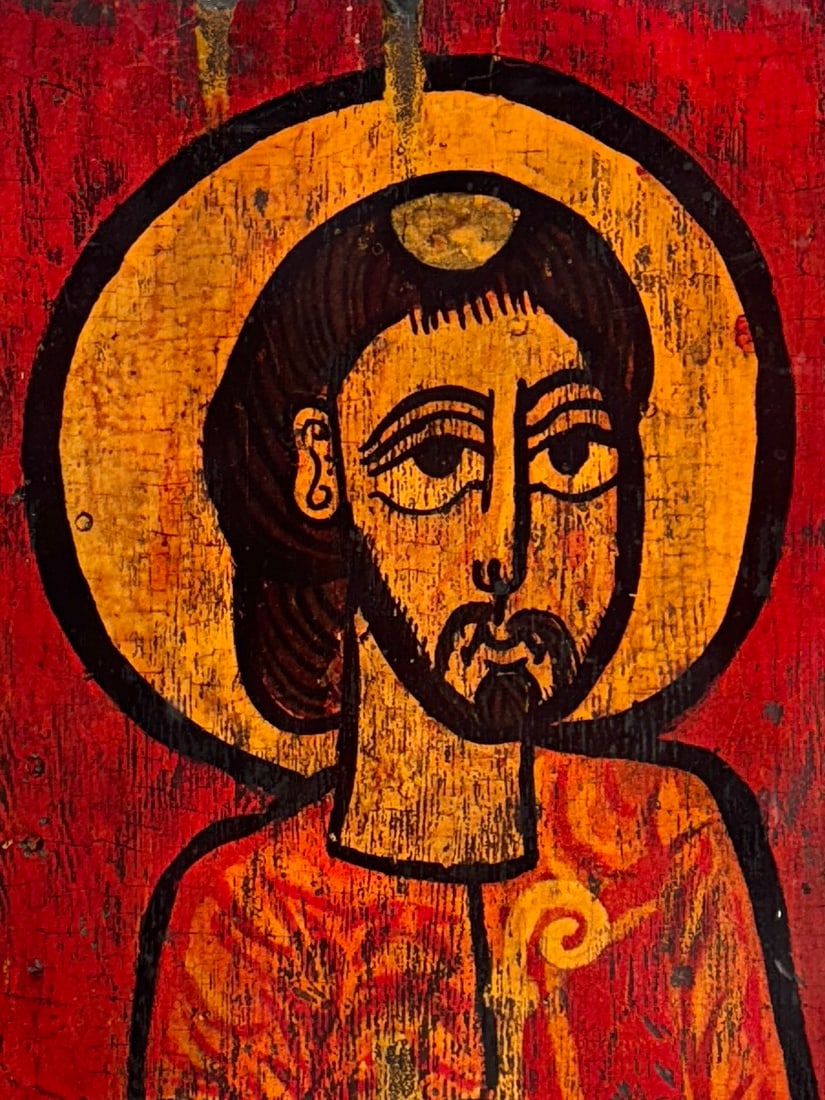 Iconic Religious Figure Painting on Wood Panel: Folk art style painting of a religious figure with halo, rendered on a wood panel. Dimensions: 22.5 x 16.5 inches.