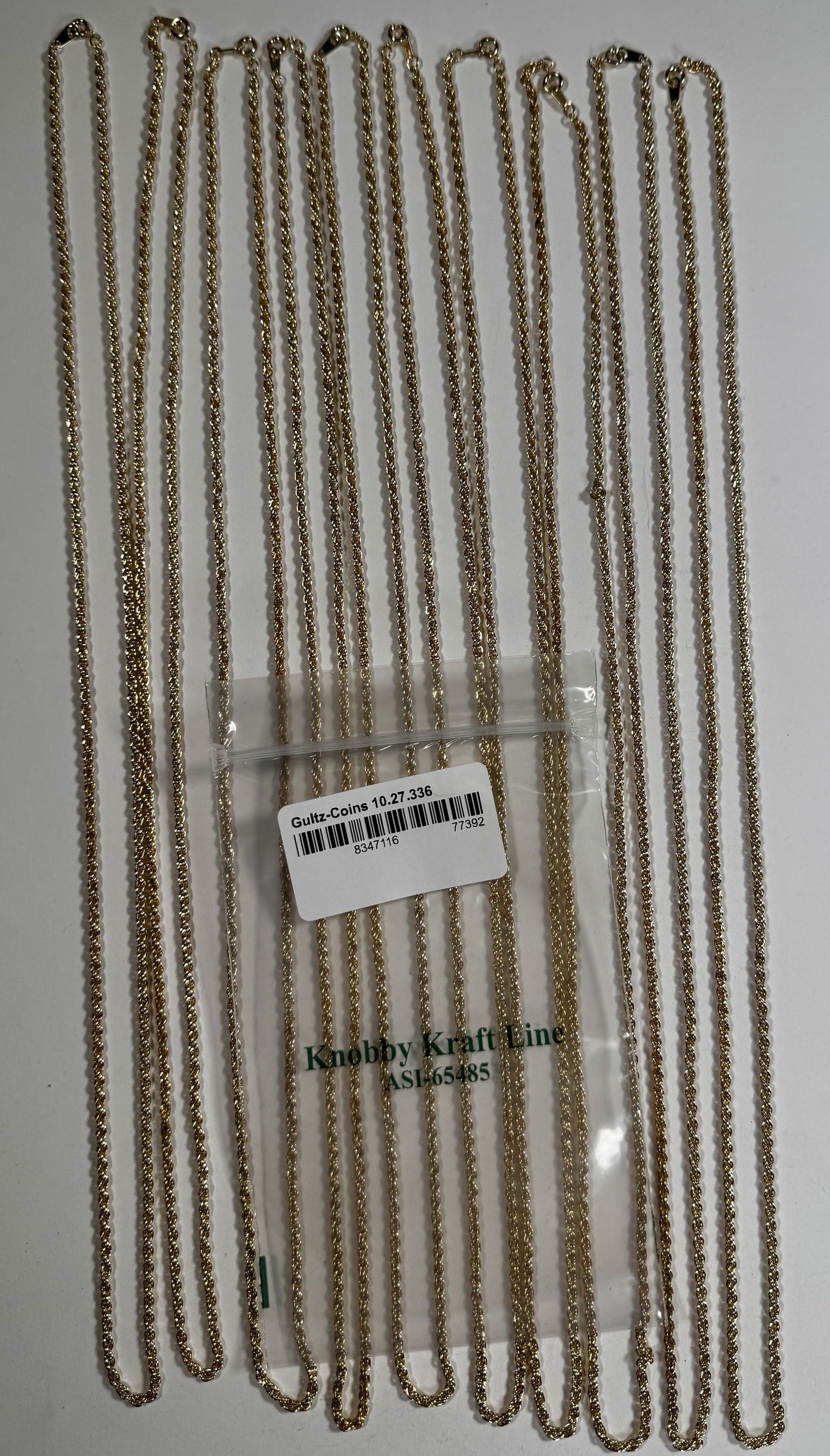 Group of Gold Tone Metal Chains: Collection of gold tone metal chains. Total weight approximately 5 oz. Longest chain measures approximately 14.5 inches.