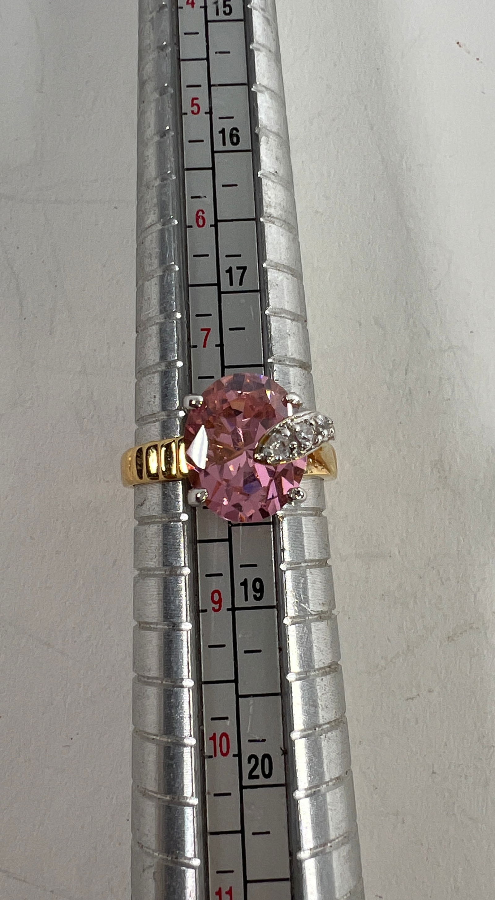 Group of Gold Tone Costume Rings: A collection of gold tone costume rings, various sizes and styles, including rings with faux gemstones and pearls. Total weight: 2.9 oz. Sizes range from 6.5 to 8 approximately.Sizes: sizes: 8,