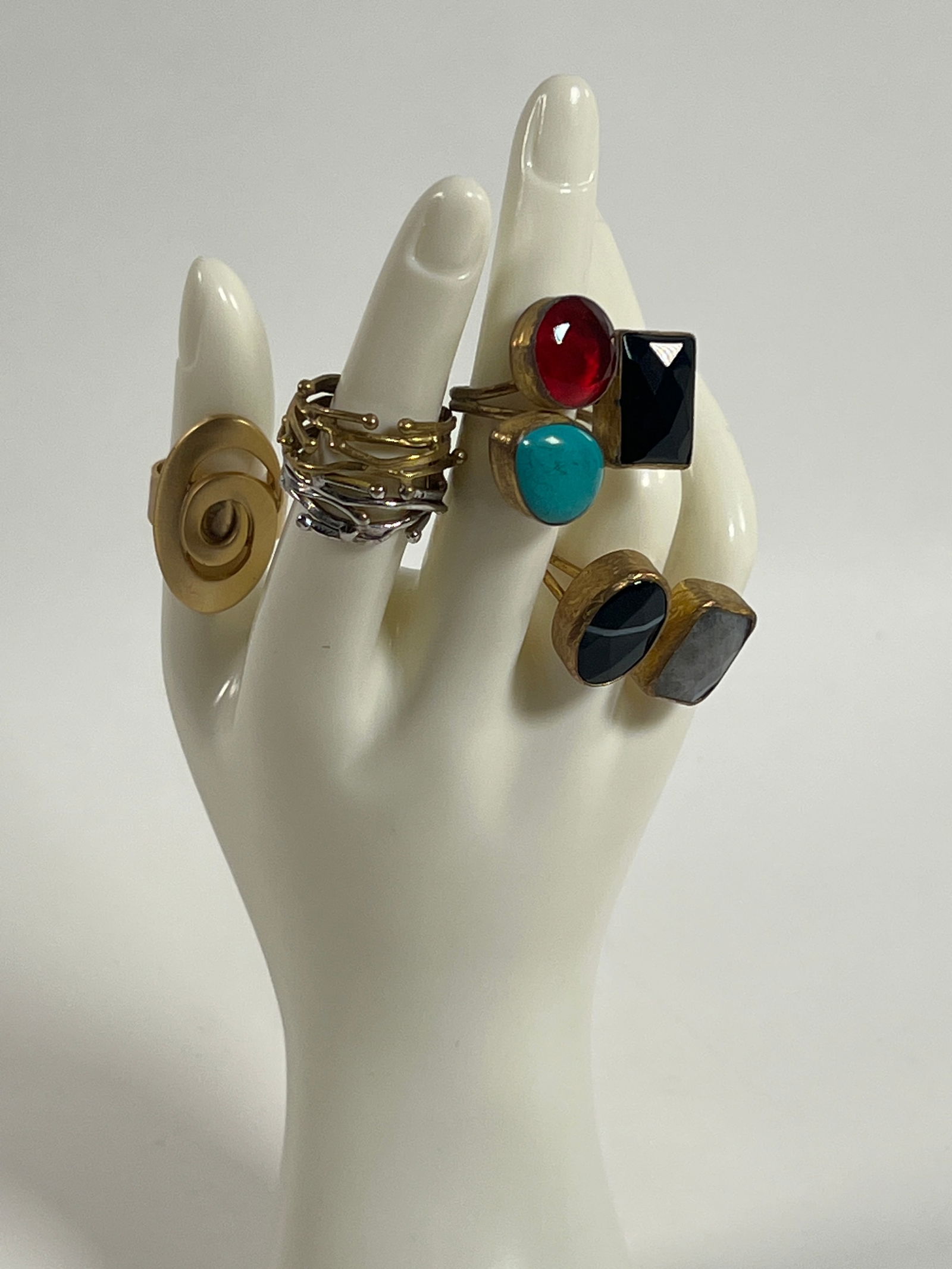 Costume Ring Assortment: Collection of ten costume rings featuring various designs and colored stones. Weight: 3 oz. Sizes: 7, 5.5, 6.5, 7, 7, 8, 7.5, 6, 8.75, 9 approx. 