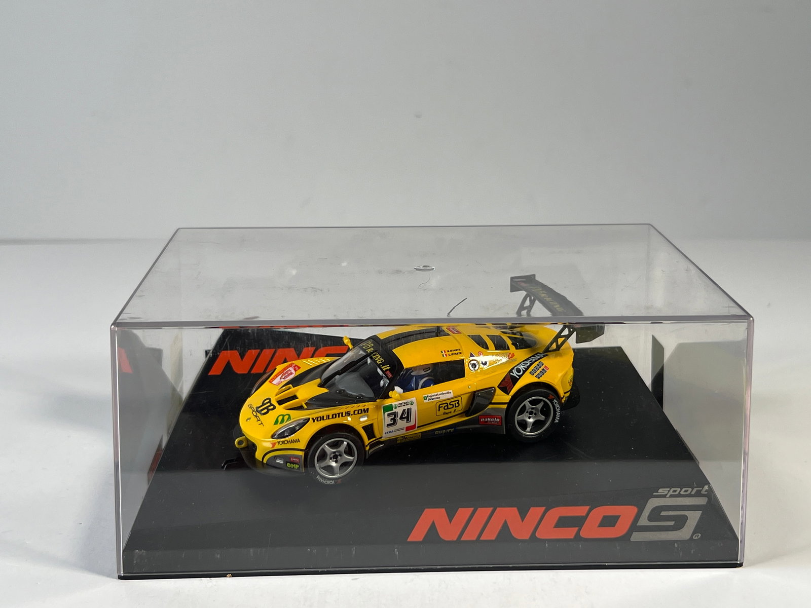 Ninco Sport Lotus Exige GT3 #34: Ninco Sport Lotus Exige GT3 PB Racing #34 1/32 Slot Car. Reference #50534, with original case. Weight: 9.4 oz.