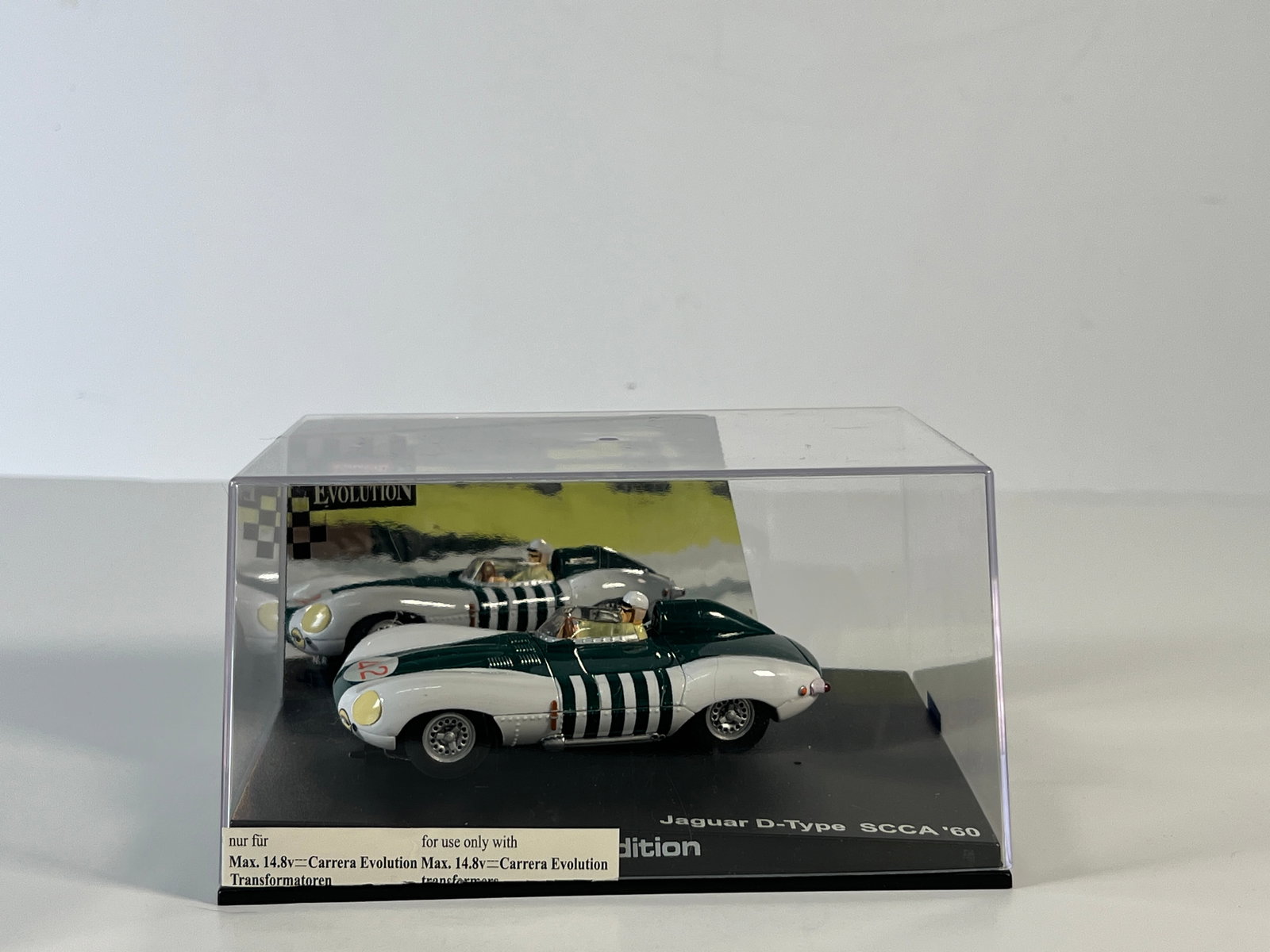 Carrera Evolution Jaguar D-Type SCCA '60 #42: Carrera Evolution Jaguar D-Type SCCA '60 #42 1/32 Slot Car, with original case. Weight: 11 oz.