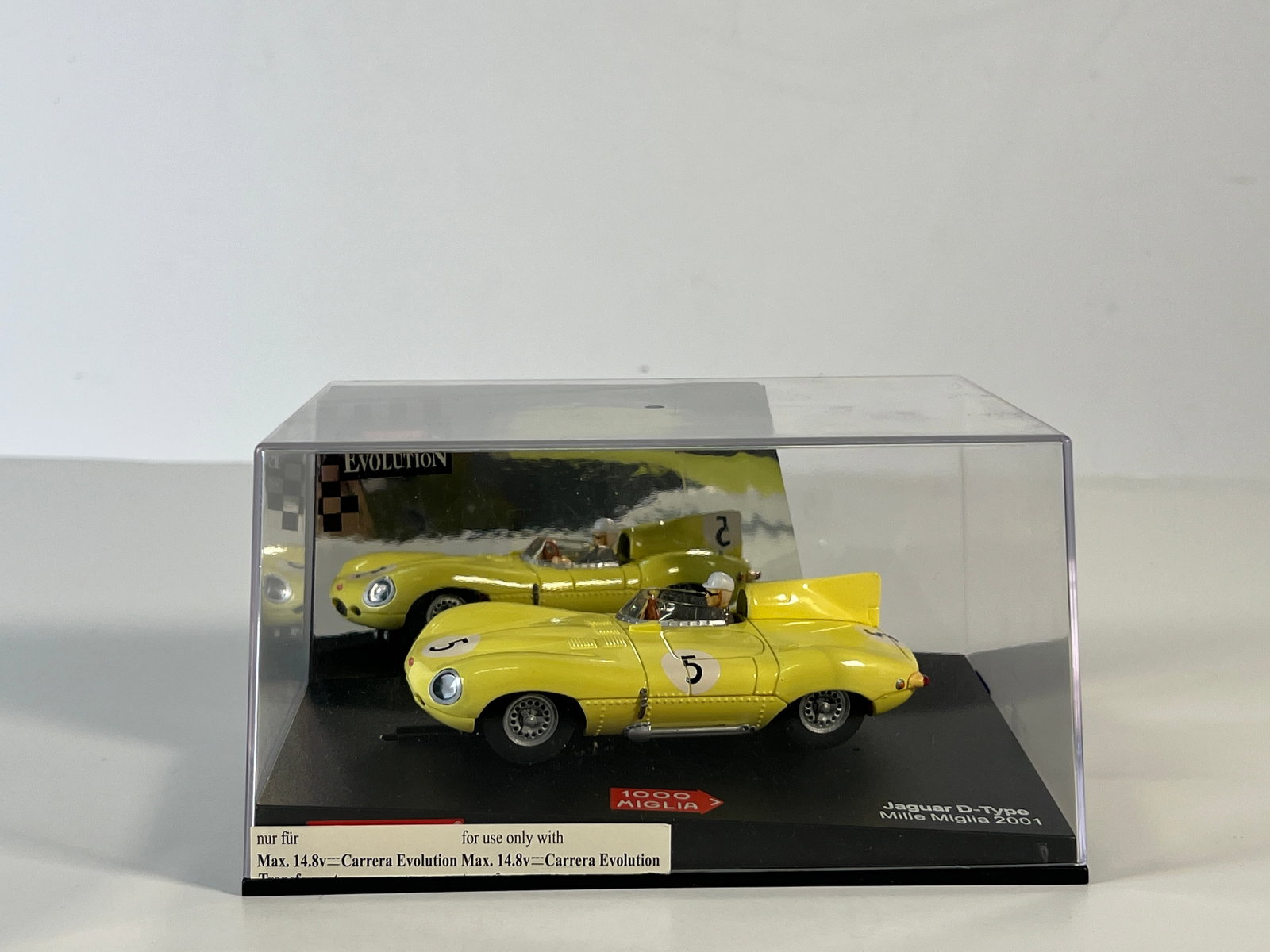 Carrera Evolution Jaguar D-Type Mille Miglia 2001 #5: Carrera Evolution Jaguar D-Type Mille Miglia 2001 #5 1/32 Slot Car, with original case. Case measures 4 x 7 inches. Weight: 12 oz.