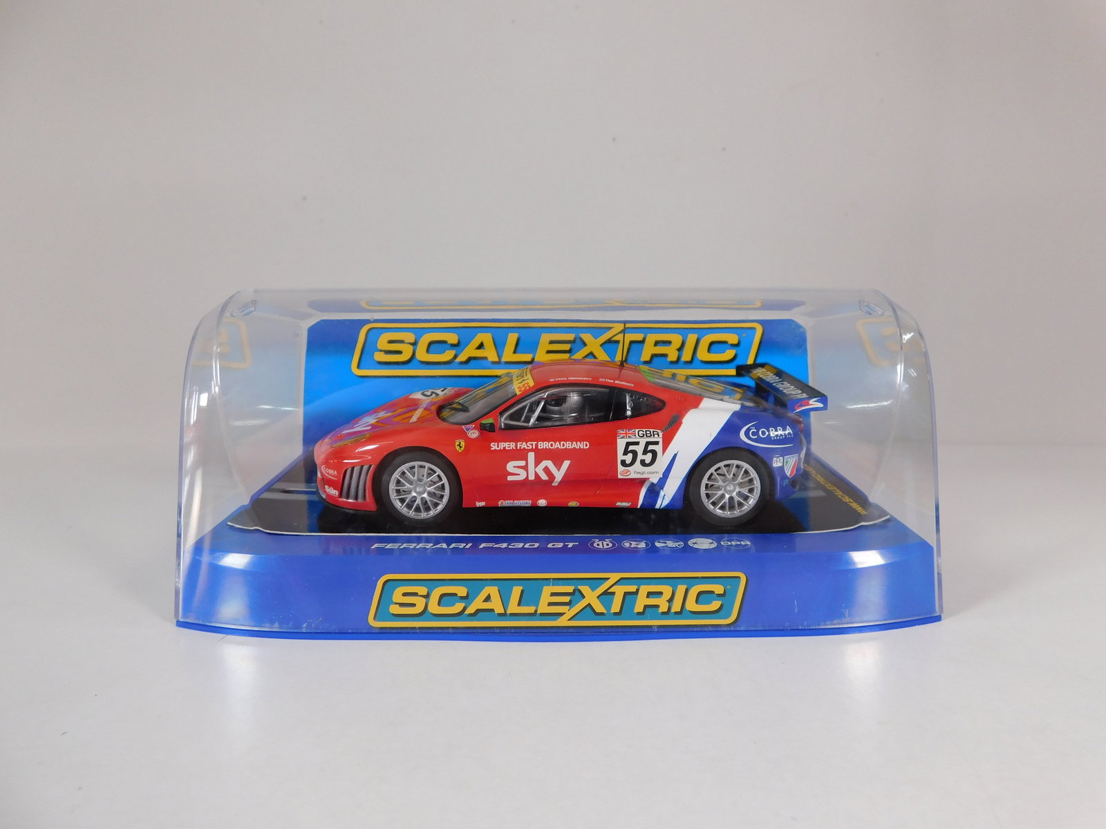 Scalextric Ferrari F430 GT2 CRS Racing #55: Scalextric Ferrari F430 GT2 CRS Racing #55 Sky 1/32 Slot Car. Reference #C3085, with original case. Weight: 9 oz.