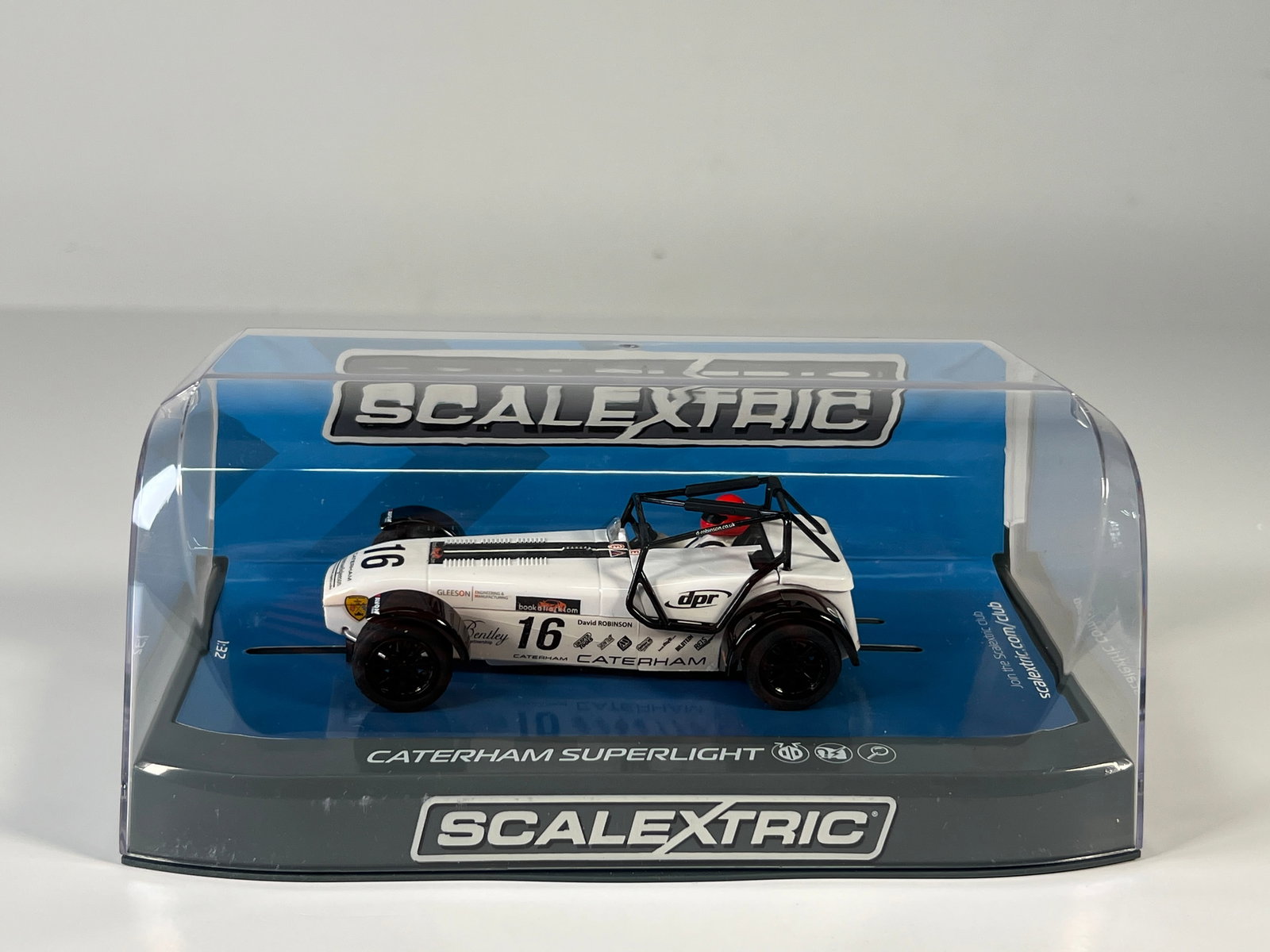 Scalextric Caterham Superlight R300-S Championship 2015 #16: Scalextric Caterham Superlight R300-S Championship 2015 D Robinson #16 1/32 Slot Car. Reference #C3723, with original case. Weight 7.1 oz.