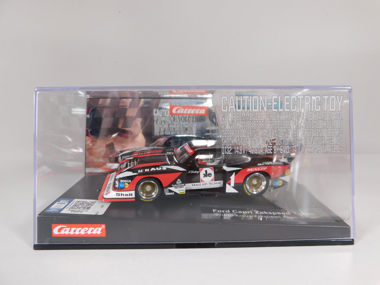 Carrera Evolution Ford Capri Zakspeed Turbo Wurth-Kraus #1: Carrera Evolution Ford Capri Zakspeed Turbo Wurth-Kraus #1 1/32 Slot Car. Reference #20027561, with original case. Weight: 16 oz.