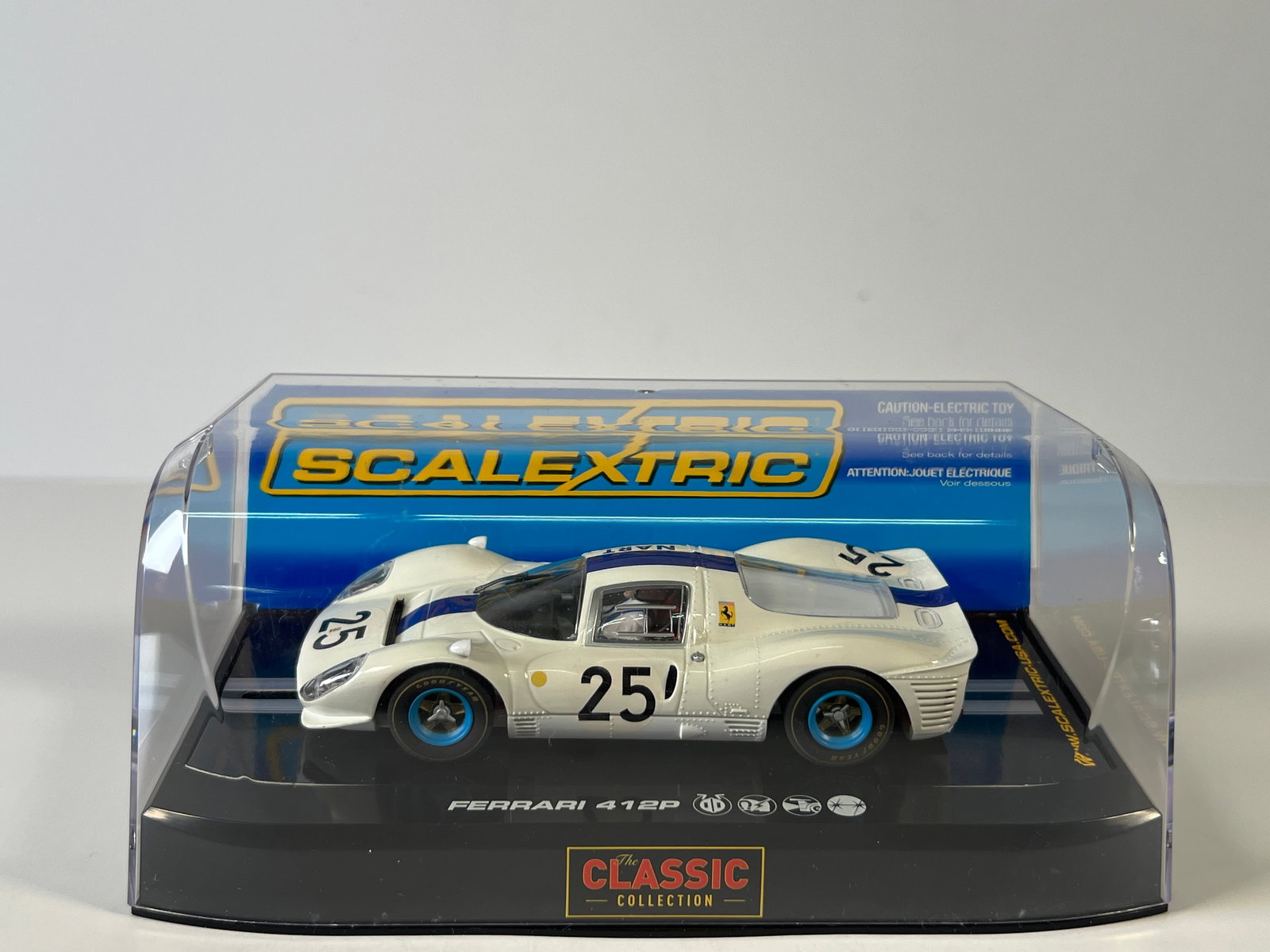 Scalextric Ferrari 412P NART #25: Scalextric Ferrari 412P NART #25 1/32 Slot Car. Reference #C2918, with original case. Weight 9 ounces.