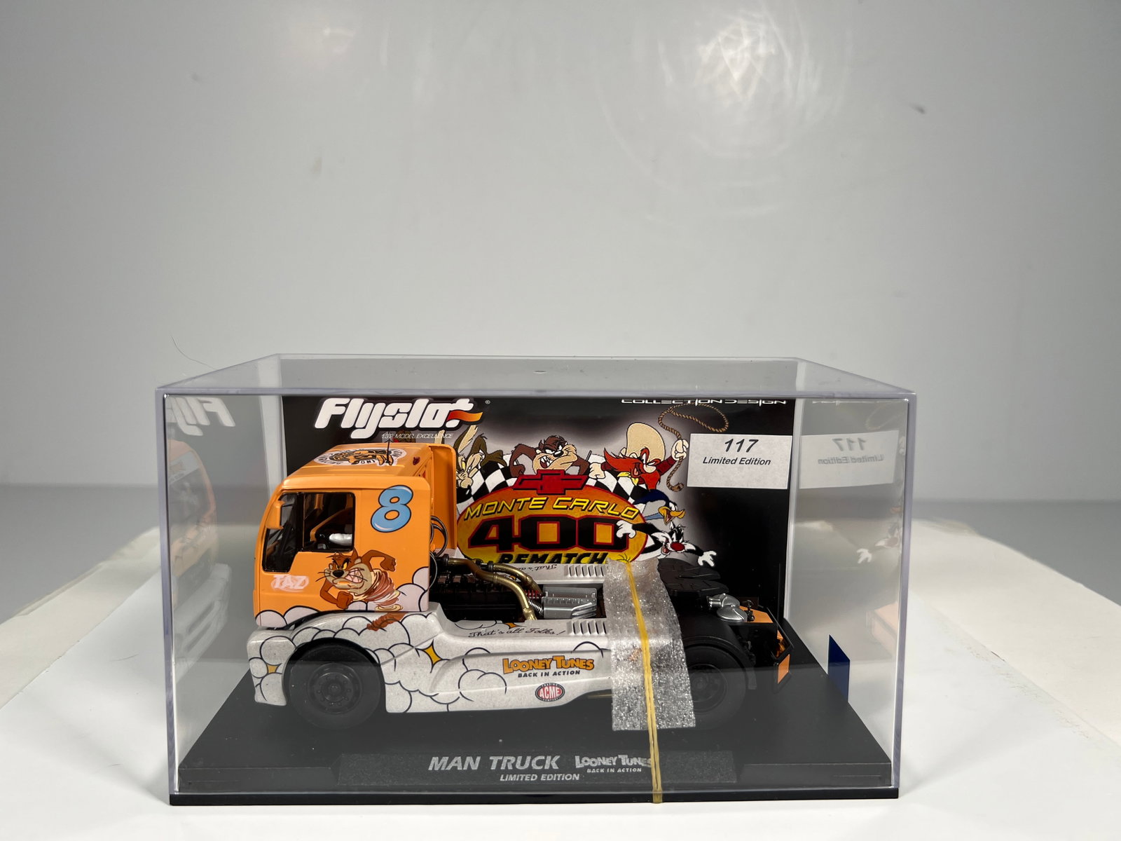 Flyslot MAN Truck 1400 Special Edition Looney Tunes #8: Flyslot MAN Truck 1400 Special Edition Looney Tunes #8 Montecarlo 1/32 Slot Car. Reference #203308, with original case. Weight: 12 oz. Limited edition #117
