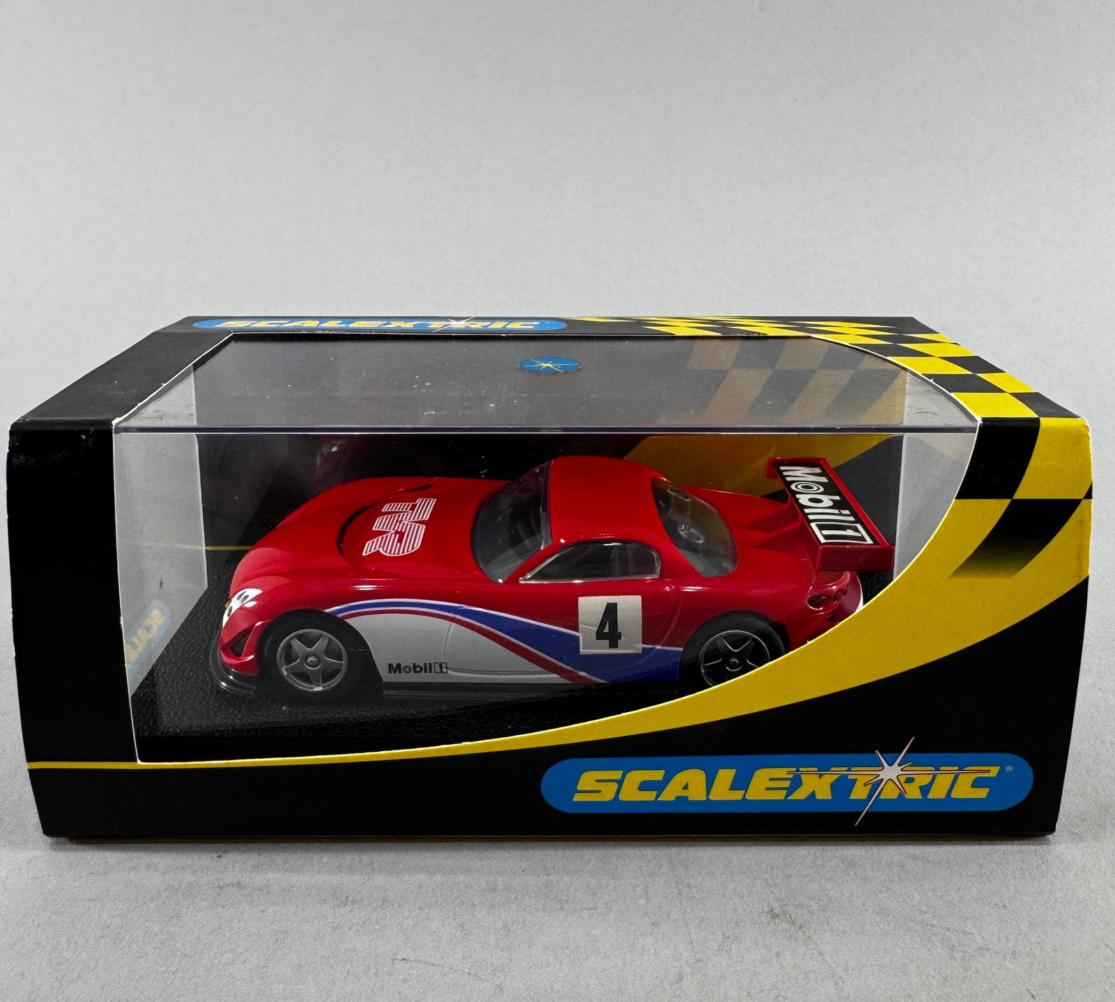 Scalextric TVR #4: Scalextric TVR #4 Mobil1 1/32 Slot Car, with original case. Weight: 8 oz.