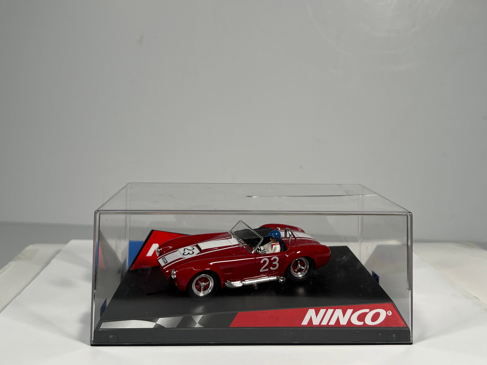 NINCO Cobra Goodwood '64 #23: NINCO Cobra Goodwood '64 #23 1/32 Slot Car. Reference #50196, with original case. Weight: 8 oz.