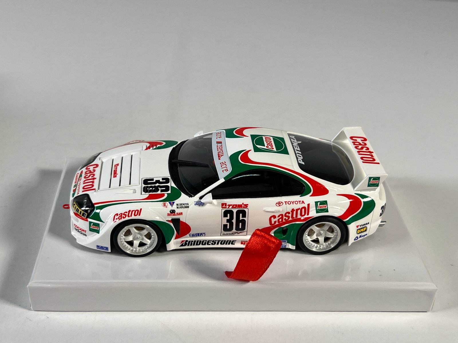 RevoSlot Toyota Supra #36: RevoSlot RS0028 Toyota Supra Castrol #36 Potenza 1/32 Slot Car, with original case. Weight: 11 oz.