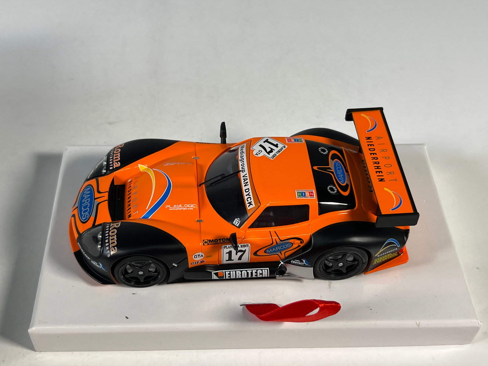 RevoSlot Marcos LM600 #17: RevoSlot RS0012 Marcos - Roma Investments #17 1/32 Slot Car, with original case. Weight: 11 oz.