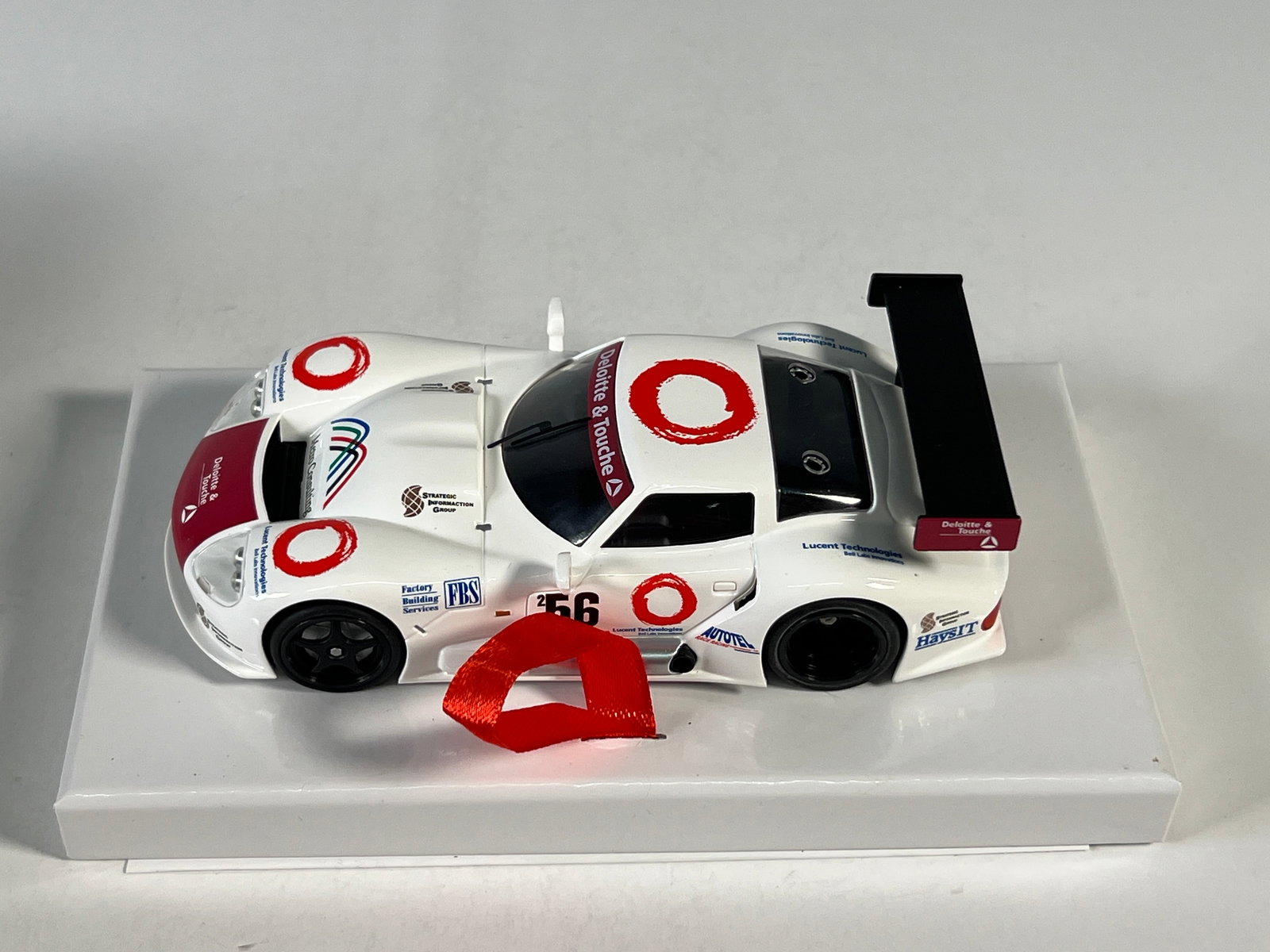 RevoSlot Marcos LM600 #56: RevoSlot RS0010 Marcos LM600 #56 Deloitte & Touche 1/32 Slot Car, with original case. Weight: 11 oz.