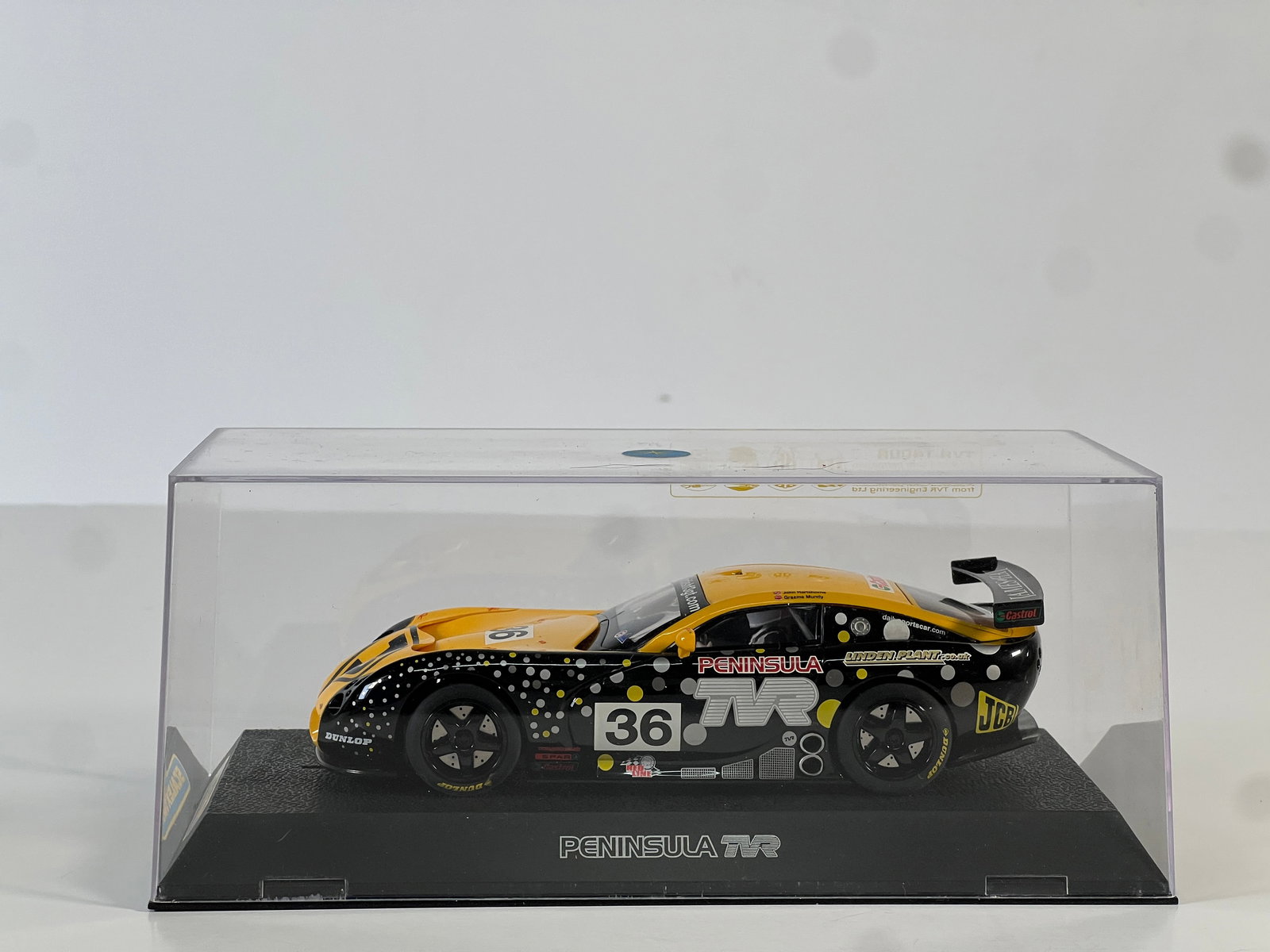Scalextric Peninsula TVR #36: Scalextric Peninsula TVR #36 JCB 1/32 Slot Car, with original case. Weight: 7 oz.