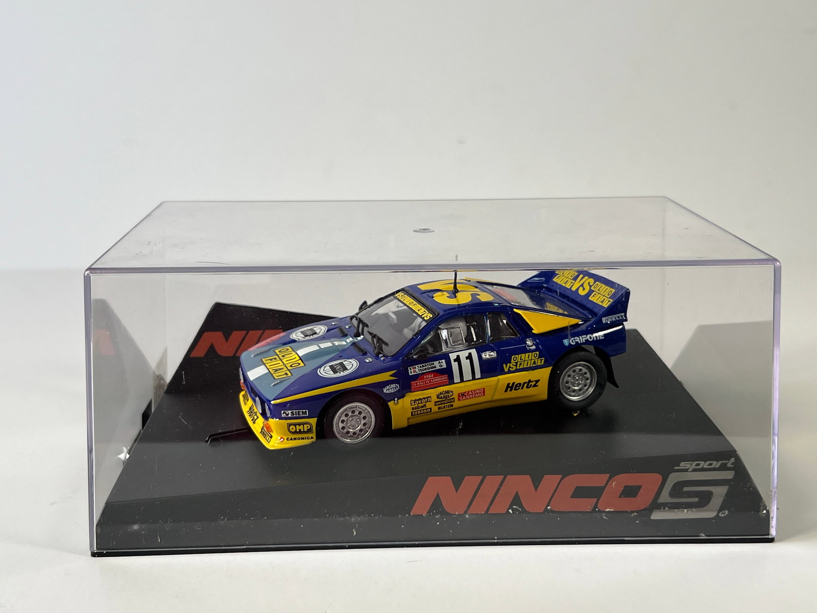 Ninco Lancia 037 Olio Fiat #11: Ninco Lancia 037 Olio Fiat #11 VS 1/32 Slot Car. Reference #50602, with original case. Weighs 11 ounces.