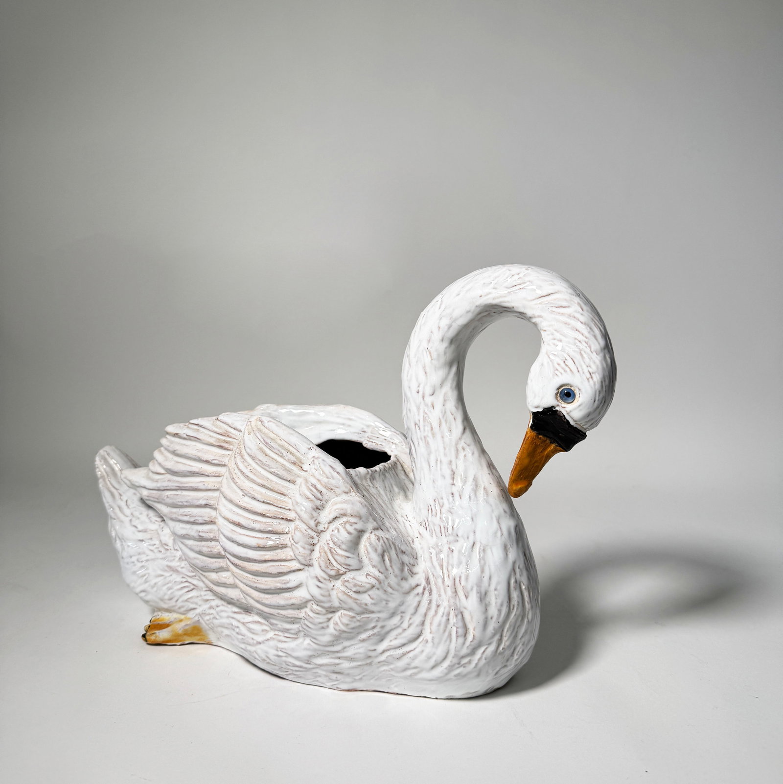 Bavent France Majolica Swan: French majolica swan by Bavent France with glass eyes, marked on bottomWeight: 4lb 13.5oz. Size: 9.5'' x 14''
