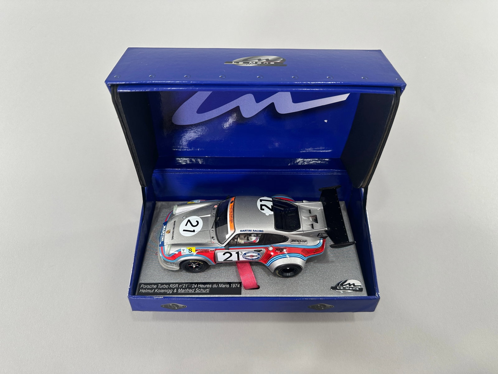 Le Mans Miniatures Porsche Turbo RSR #21 Le Mans 1974: Le Mans Miniatures Porsche Turbo RSR #21 - 24 Heures du Mans 1974 1/32 slot car in original packaging. Helmut Koienigg & Manfred Schurti. Dimensions: 7.25 x 4 x 3.125 inches. Weight: 11 oz.
