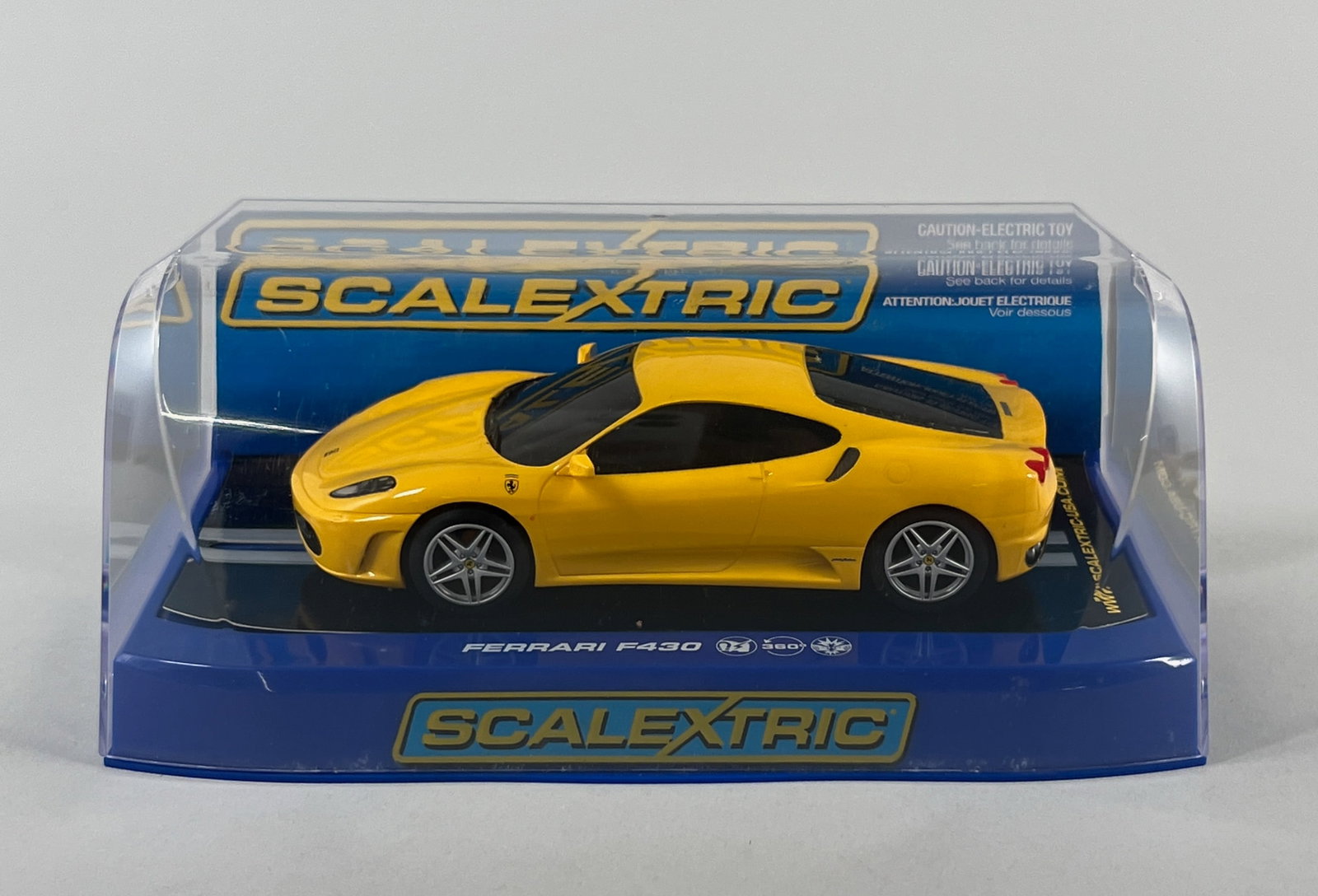 Scalextric Ferrari F430 Yellow "Drift": Scalextric Ferrari F430 1/32 scale slot car in its original packaging. Weight 9 oz. Dimensions: 4'' x 7.5'' x 4''