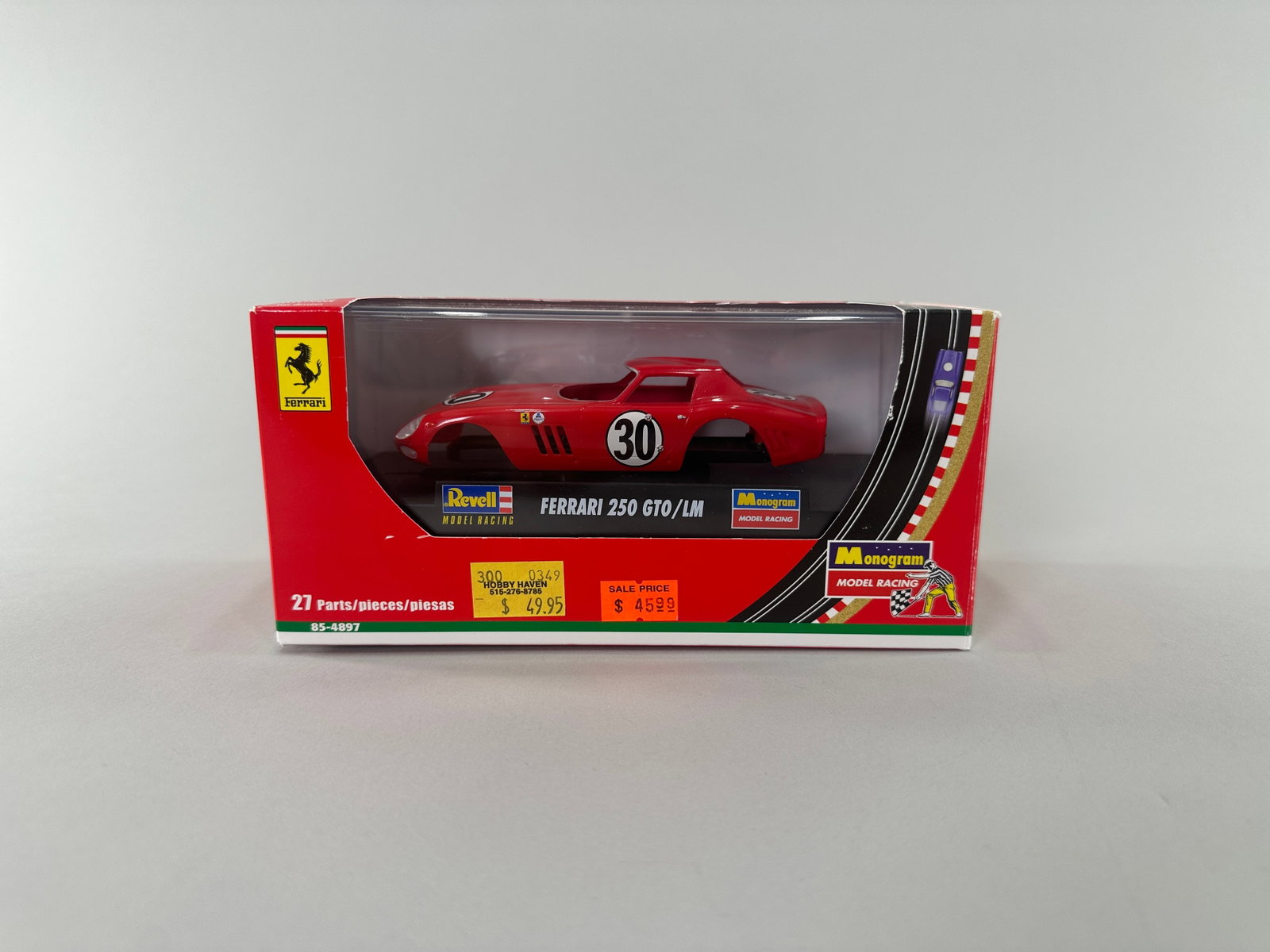 Monogram Ferrari 250 GTO/LM Slot Car Assembly Kit: Monogram Ferrari 250 GTO/LM slot car assembly kit, 1/32 scale. New in box. Weight: 10oz. Dimensions: 7 1/2'' x 3 5/8'' x 3 3/4''.