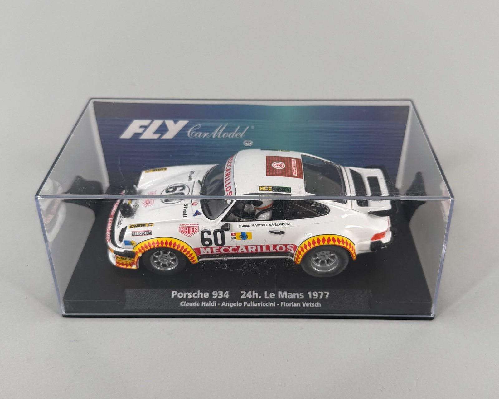 FLY Car Model - Porsche 934 24h Le Mans 1977 #60: FLY Car Model - Porsche 934 24h Le Mans 1977 #60 Meccarillos 1/32 Slot Car. Reference #88291. Dimensions: 3" x 6.5" x 3.25". Weight: 5oz.