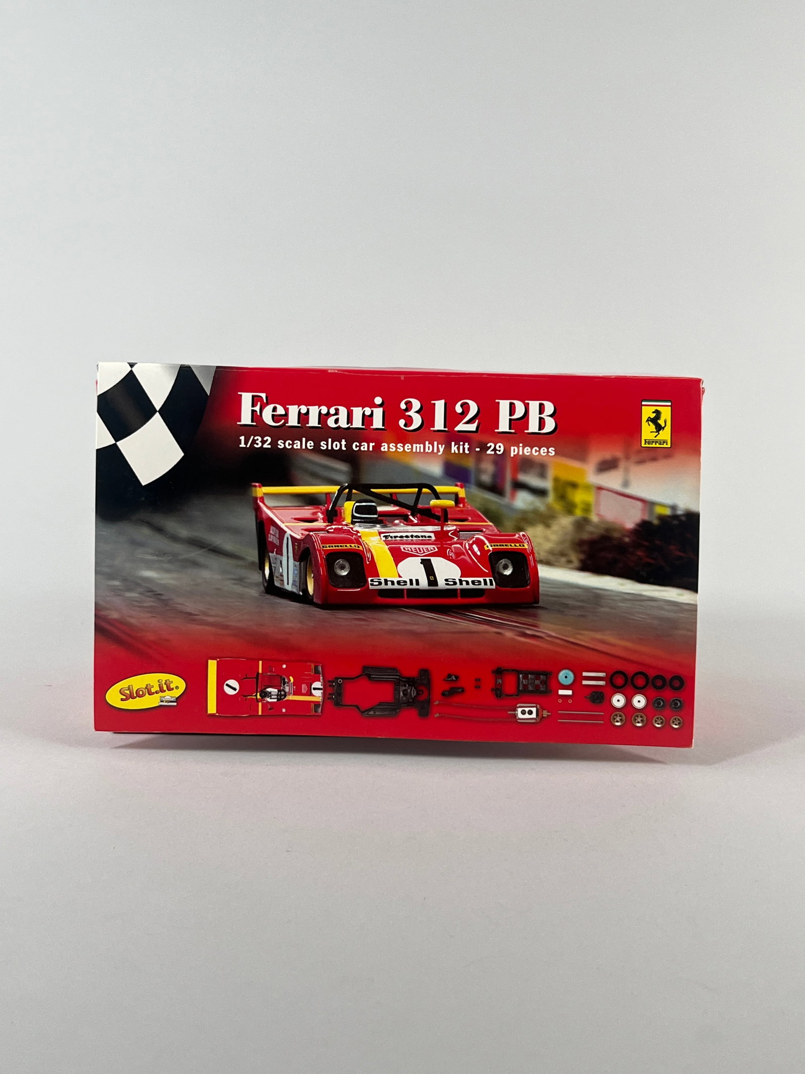 Slot.it Ferrari 312 PB 1/32 Scale Slot Car Assembly Kit #85: This is a 1/32 scale slot car assembly kit of the Ferrari 312 PB #85, featuring 29 pieces. The kit is from Slot.it and is an officially licensed Ferrari product. The box displays detailed images of