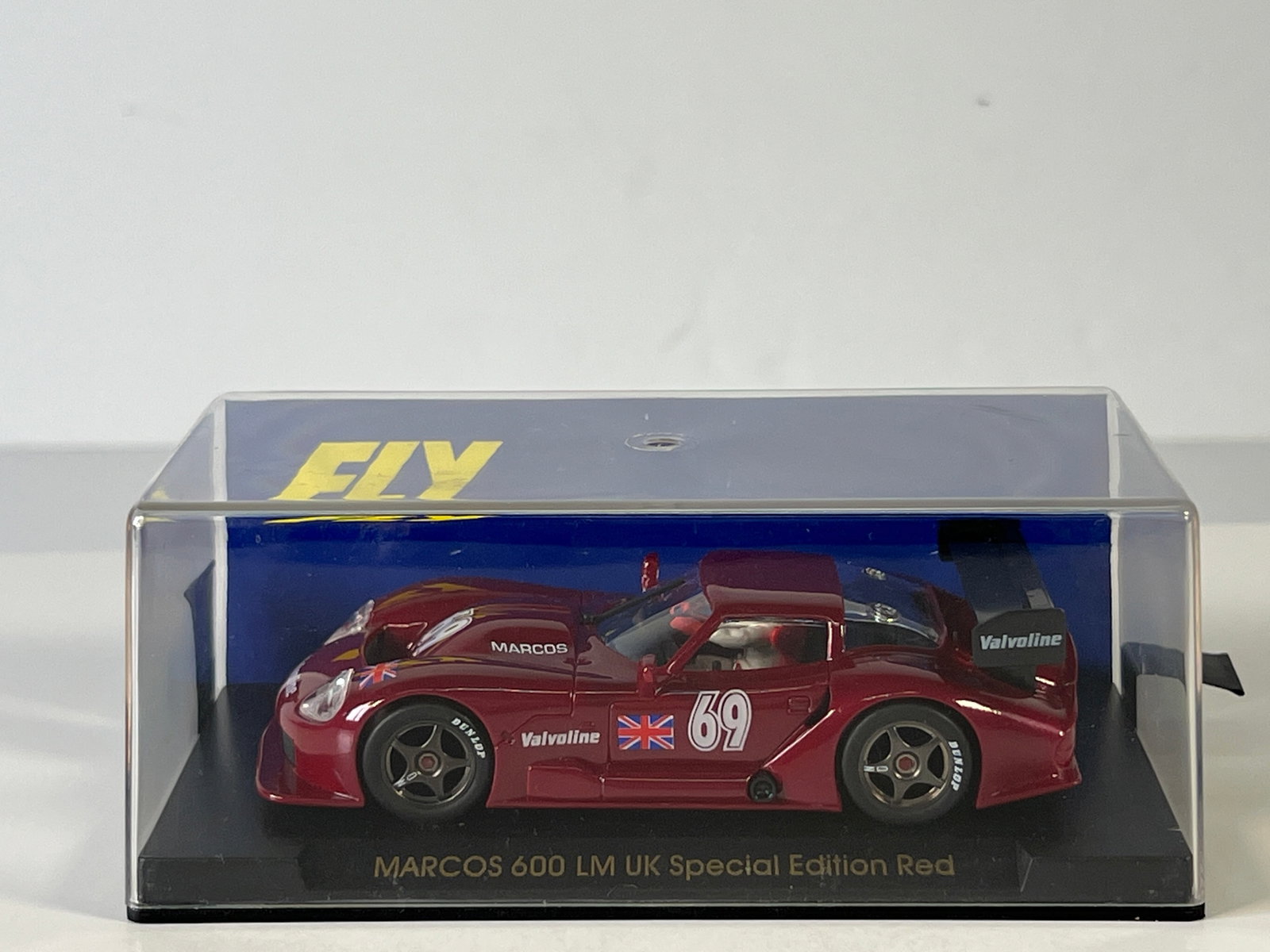 Fly Marcos Burdeos 600 LM UK Special Edition Red #69: Fly Marcos Burdeos 600 LM UK Special Edition Red #69 Valvoline 1/32 Slot Car. Reference #E21, with original case. Weight: 6 oz.