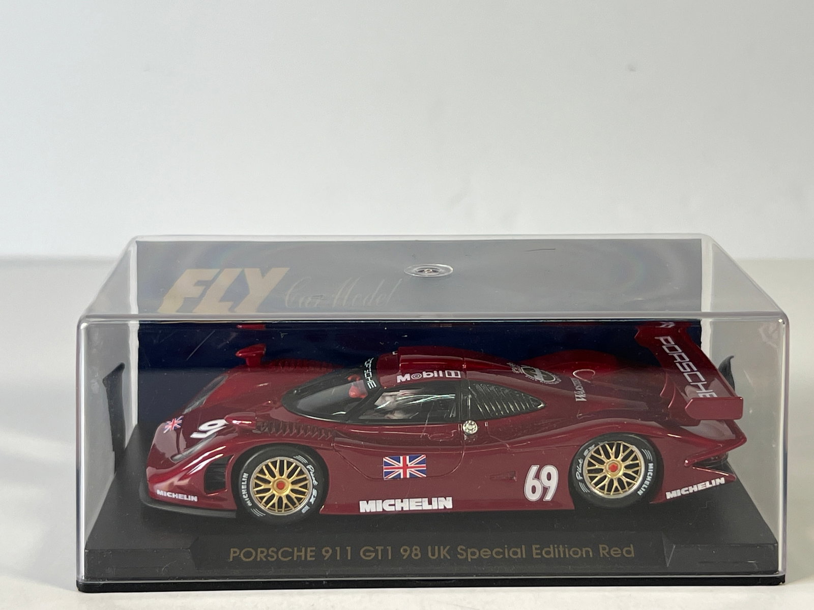 Fly Car Model Porsche 911 GT1 '98 UK Special Edition Red #69: Fly Car Model Porsche 911 GT1 '98 UK Special Edition Red #69 Michelin 1/32 Slot Car. Reference #E72, with original case. Weight: 6 oz.