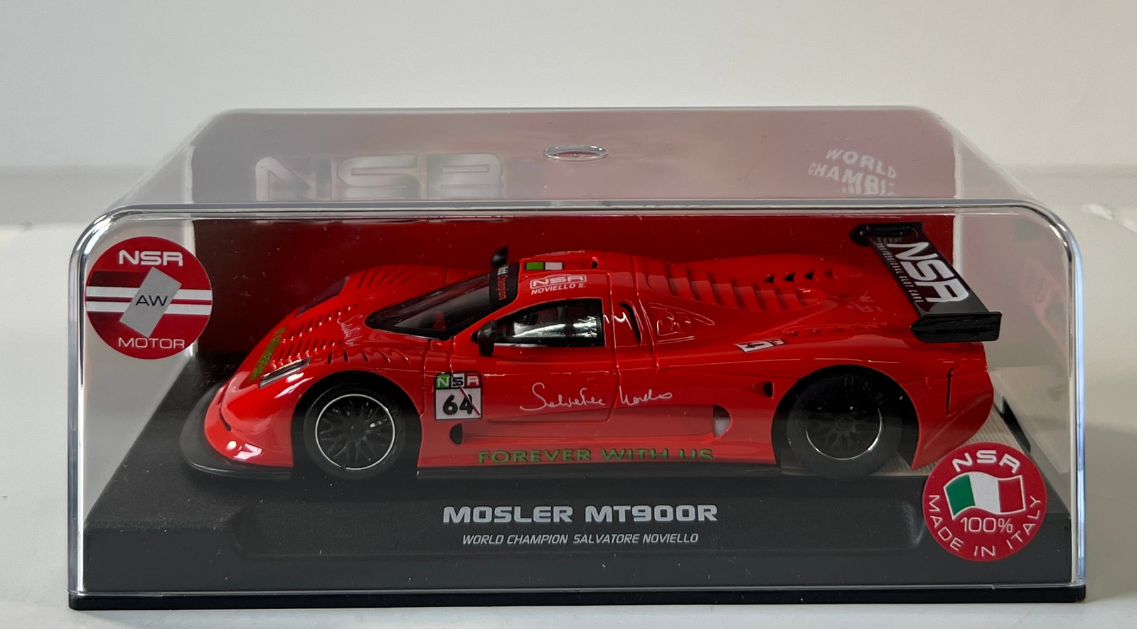 NSR Mosler MT900R World Champion Salvatore Noviello #64: NSR 0094 Mosler EVO3 6th Ann. MT900R World Champion Salvatore Noviello #64 Forever with us 1/32 Slot Car, with original case. AW Motor. Weight: 7 oz.