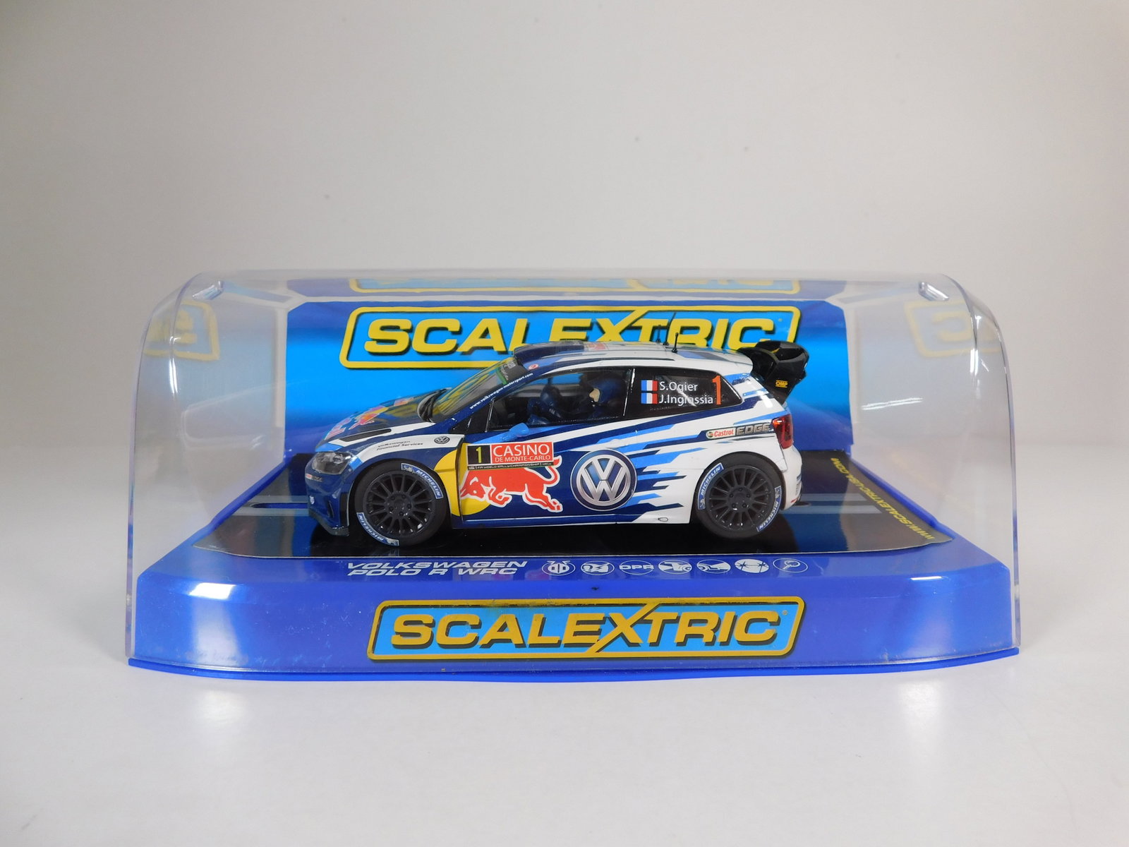 Scalextric Volkswagen Polo R WRC Monte Carlo Rally 2015 #1: Scalextric Volkswagen Polo R WRC S. Ogier / J. Ingrassia Monte Carlo Rally 2015 #1 Redbull 1/32 Slot Car. Reference #C3744, with original case. Weight: 8.2 oz.
