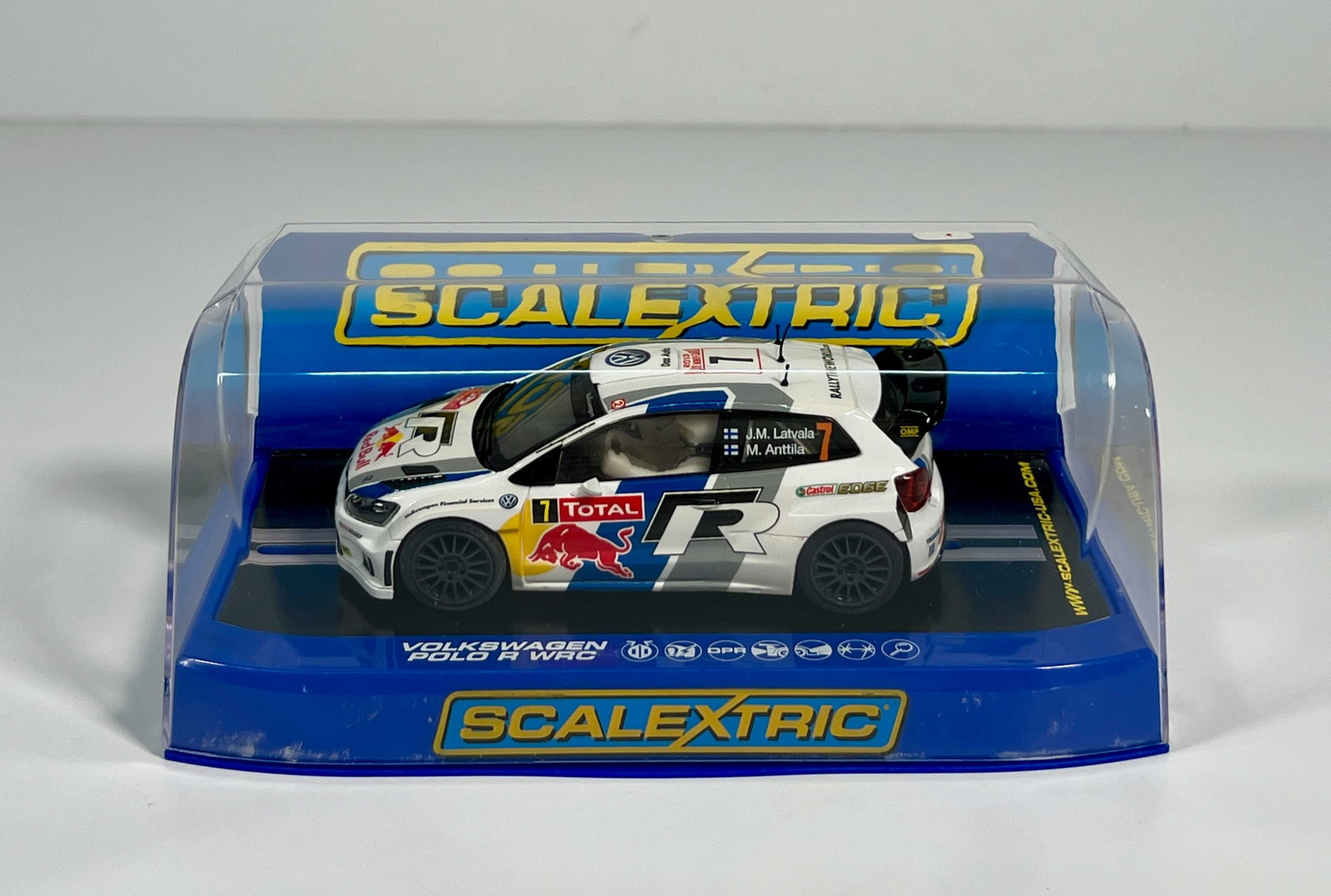 Scalextric Volkswagen Polo R WRC Monte Carlo Rally 2013 #7: Scalextric Volkswagen Polo R WRC Latvala/Anttila Monte Carlo Rally 2013 #7 Redbull 1/32 Slot Car. Reference #C3524, with original case. Size 3.5'' x 7.25'', weight: 7oz.