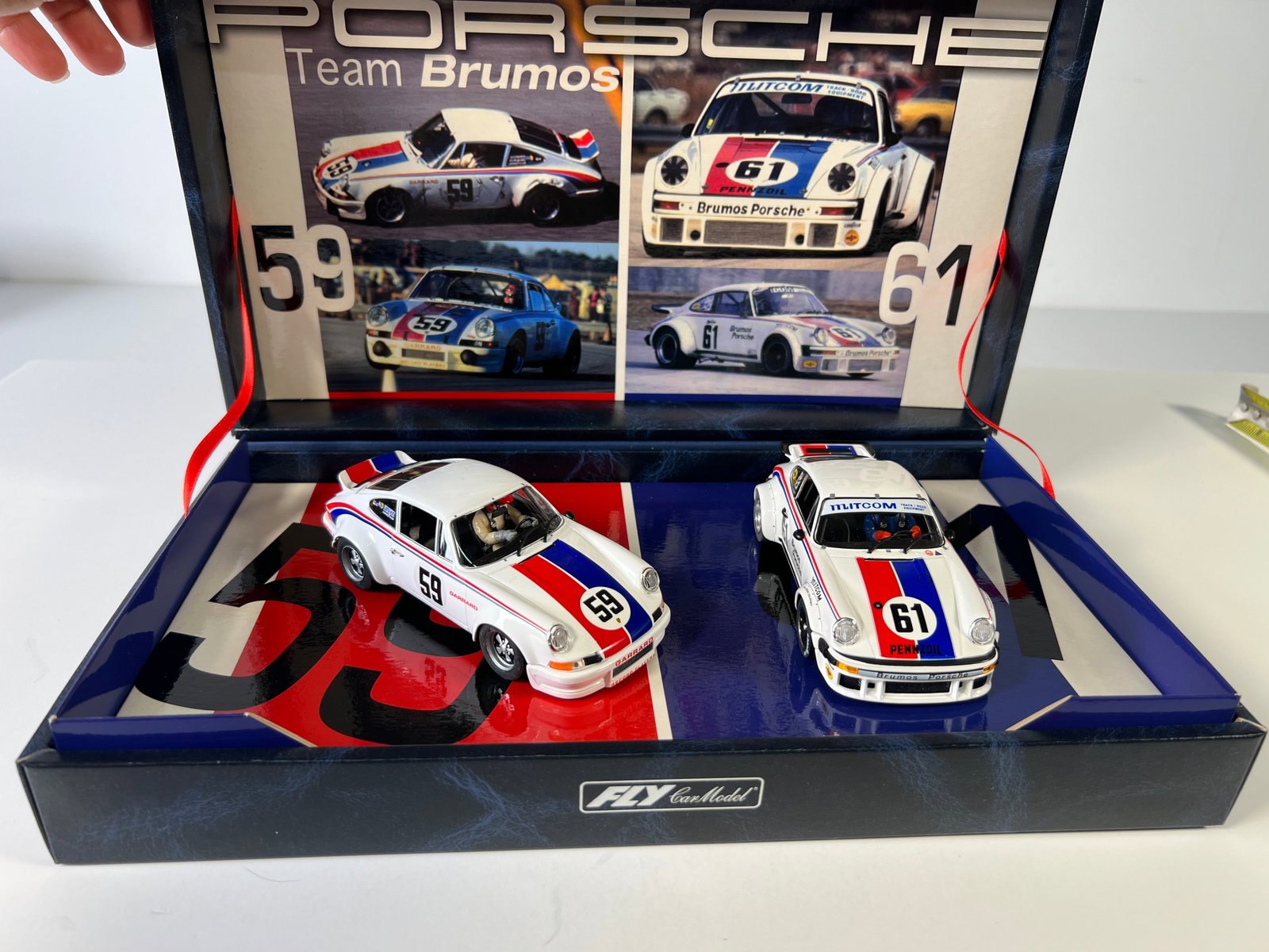 Fly Car Model Porsche Team Brumos Slot Car Set: Fly Car Model Porsche Team Brumos #59 #61 1/32 Slot Cars, with original case. Weight 18 ounces. 