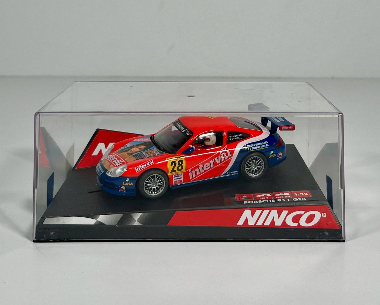 Ninco Porsche 911 GT3 Interviu #28: Ninco Porsche 911 GT3 Interviu #28 1/32 Slot Car. Reference #50259, with original case. Dimensions: 3.5 x 7.75 inches. Weight: 9oz.
