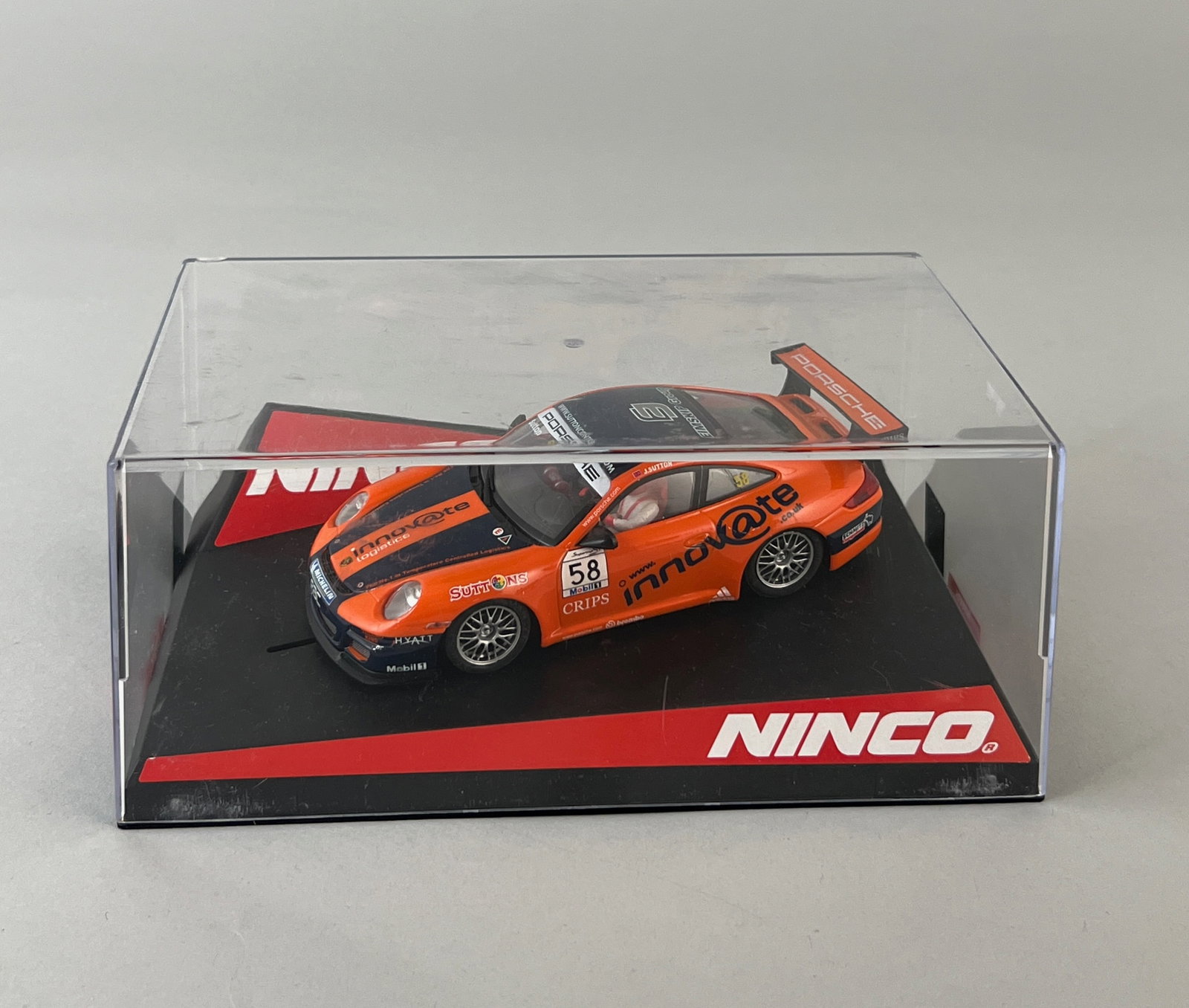 Ninco Porsche 911 GT3 RSR #58: Ninco Porsche 911 GT3 RSR "Innovate" #58 1/32 slot car. Weight - 11 ounces. Dimensions: 3.75'' x 7.5'' x 4.75''. 